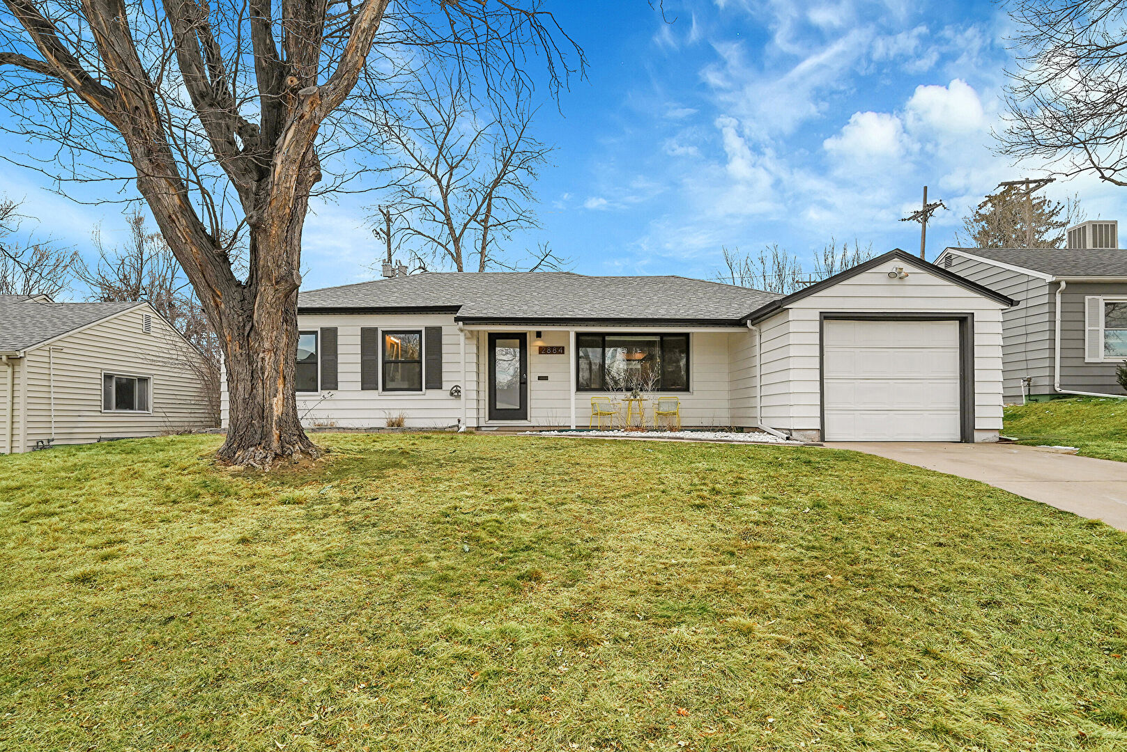 Front at 2884 S Harrison Street, Denver, CO 80210, listed by Julia Stone