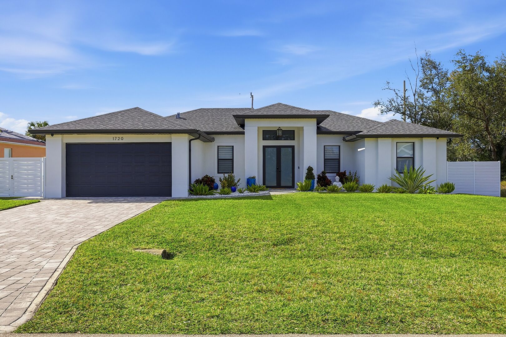 Front at 1720 Southwest 19th Place, Cape Coral, FL 33991, listed by Brett Crume