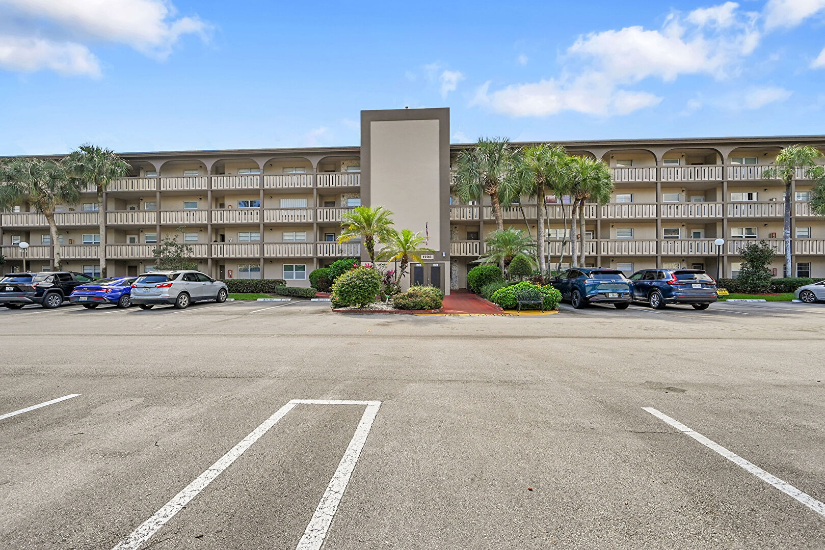 Front at 1702 Andros Isle, E1, Coconut Creek, FL 33066, listed by Diana Vasconez