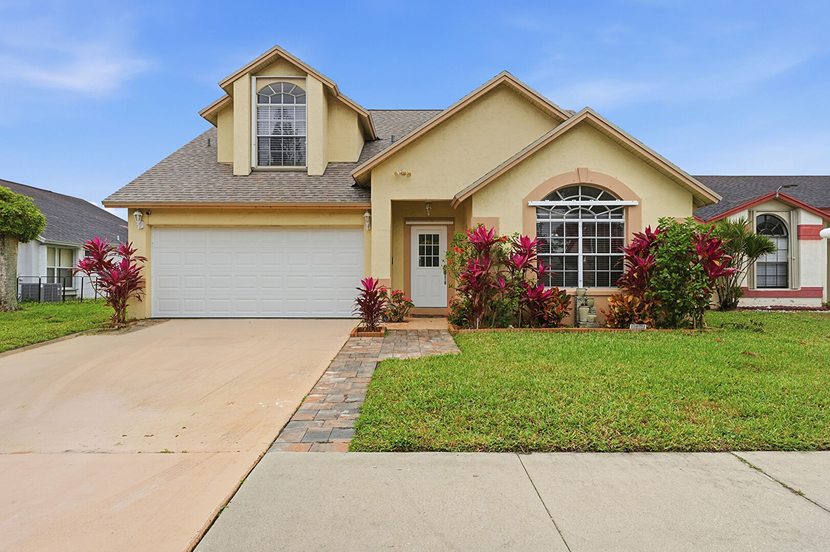 Front at 2805 Foxhall Drive E, West Palm Beach, FL 33417, listed by Chris Dyer