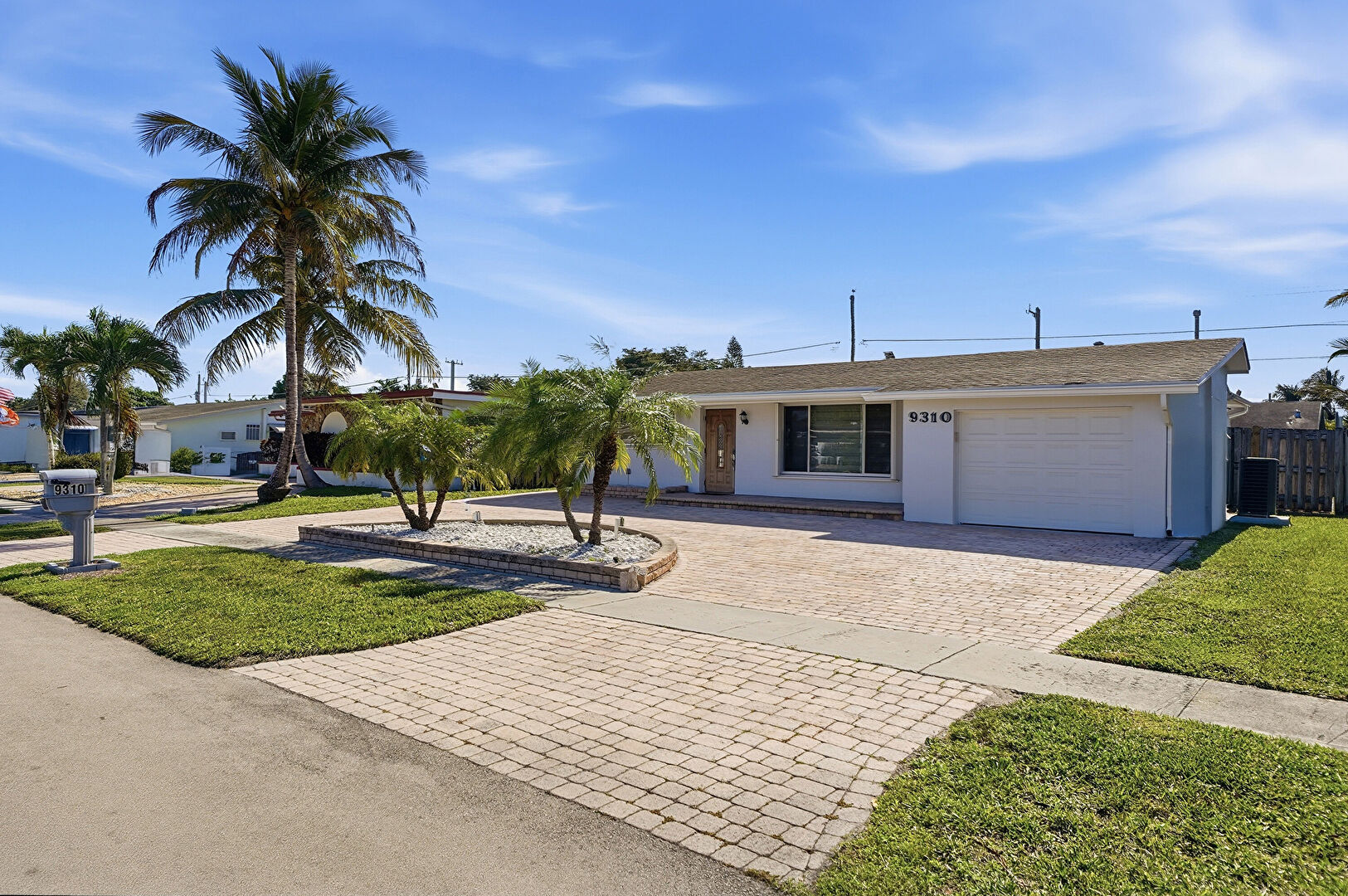 Front at 9310 Northwest 26th Street, Sunrise, FL 33322, listed by Alejandro Cuartas