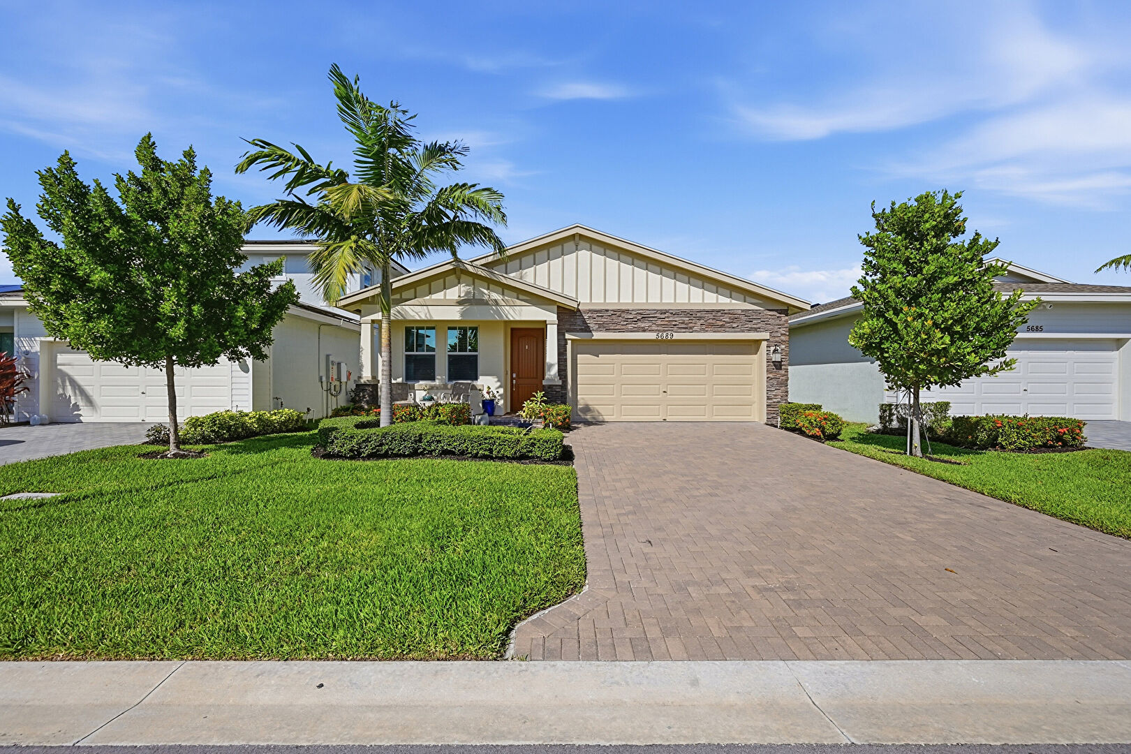 Front yard at 5689 Graceful Way, Delray Beach, FL 33484, listed by Jesse Colon