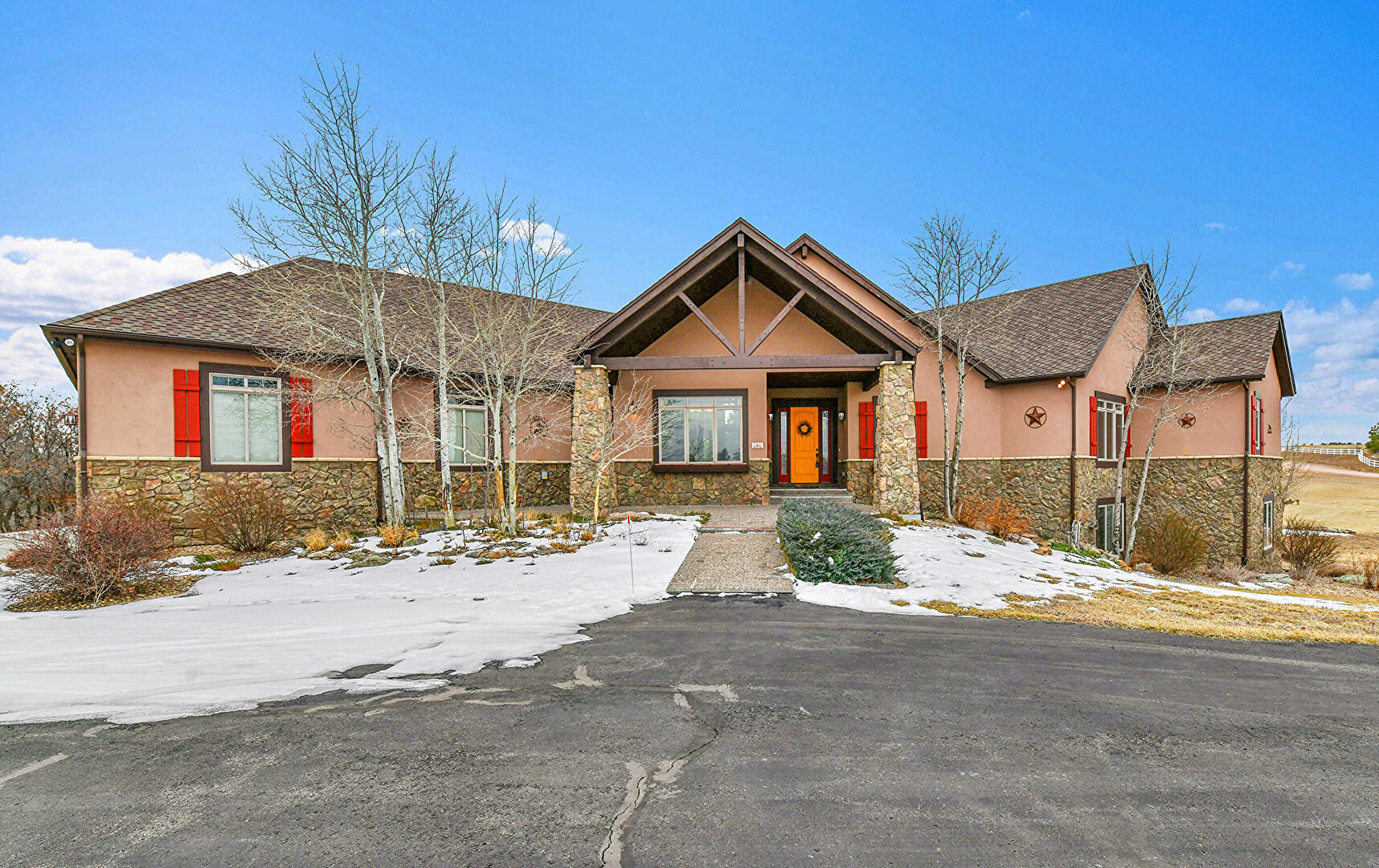 Front at 12894 Crowfoot Springs Road, Larkspur, CO 80118, listed by Mike & Ed Hardey