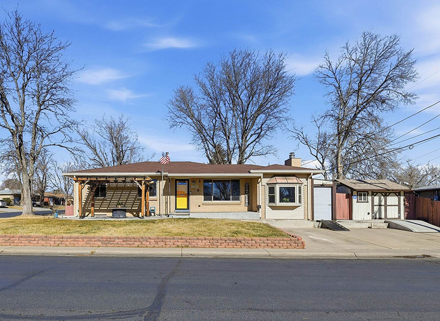 Front at 5785 West Arkansas Avenue, Lakewood, CO 80232, listed by Karen Esquibel