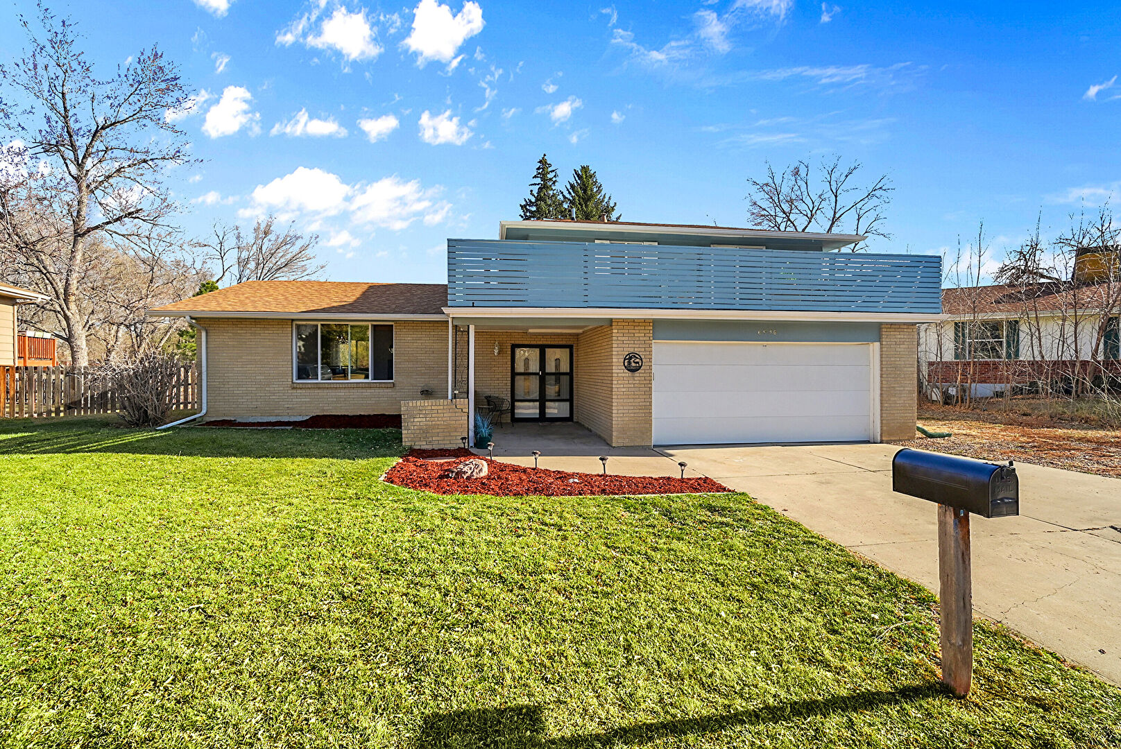 Front at 6956 North Robb Street, Arvada, CO 80004, listed by James Norman