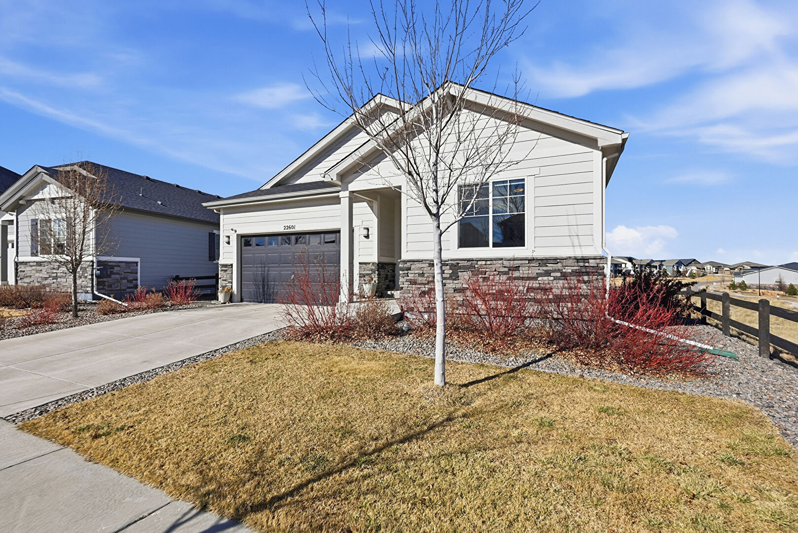 Front at 22601 East Narrowleaf Circle, Aurora, CO 80016, listed by Pamela Shaw