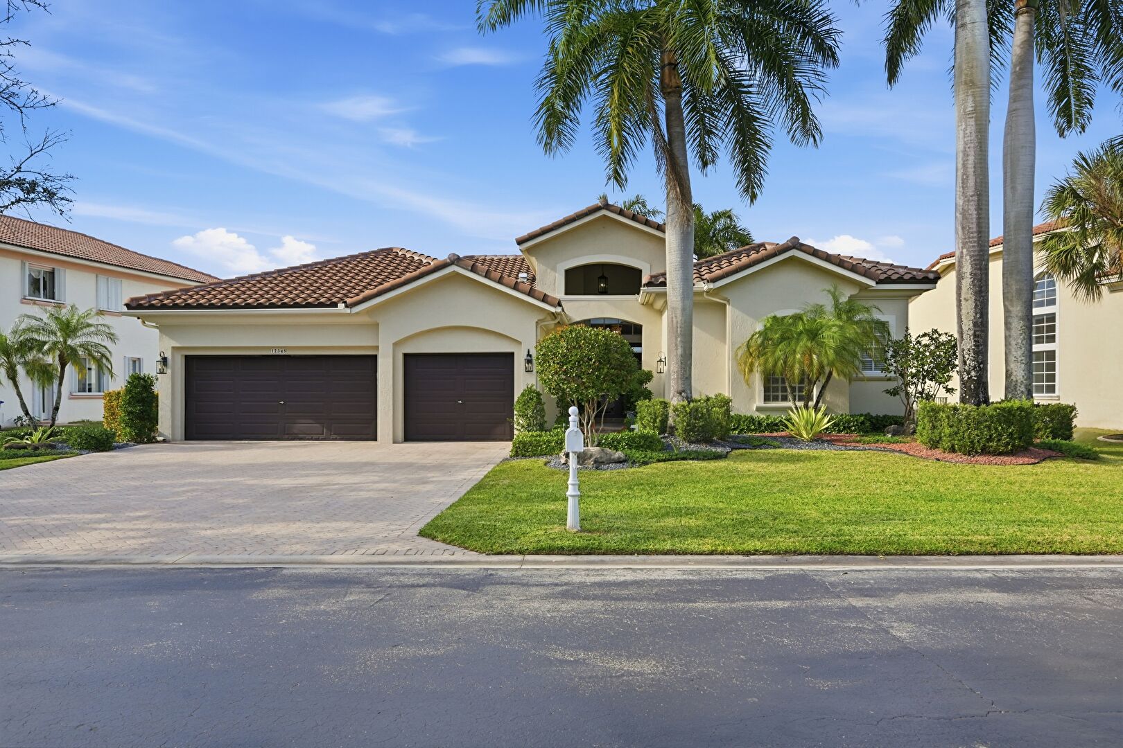 Front at 12345 Northwest 48th Drive, Coral Springs, FL 33076, listed by Laura Sanders