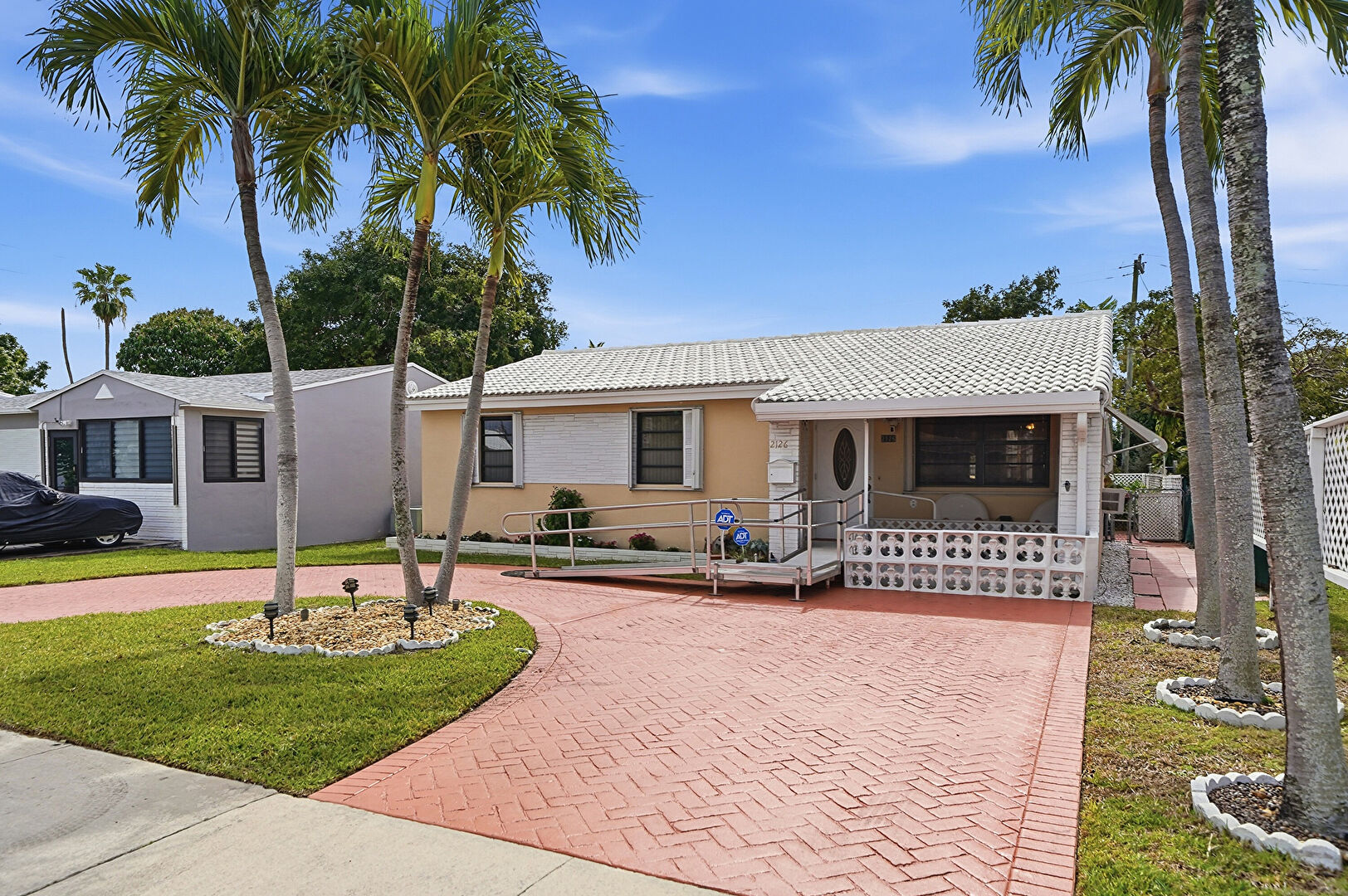 Front at 2126 Taft Street, Hollywood, FL 33020, listed by Vesta Eanes