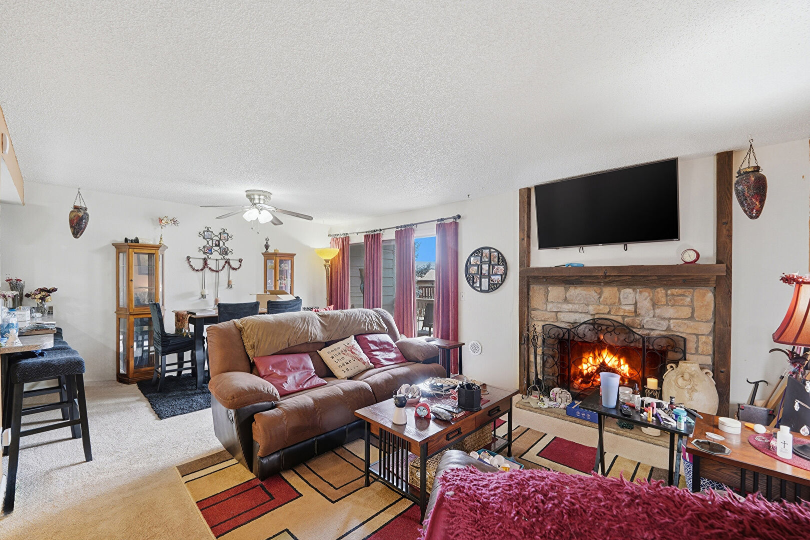 Living Room at 4896 s Dudley St. unit 9-4, littleton, CO 80123, listed by Nina Valdez