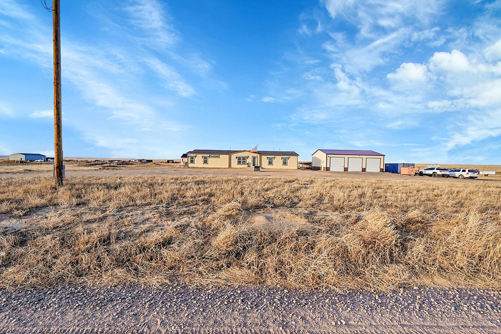 Front at 41219 County Road 84, Briggsdale, CO 80611, listed by Brooklie Grant