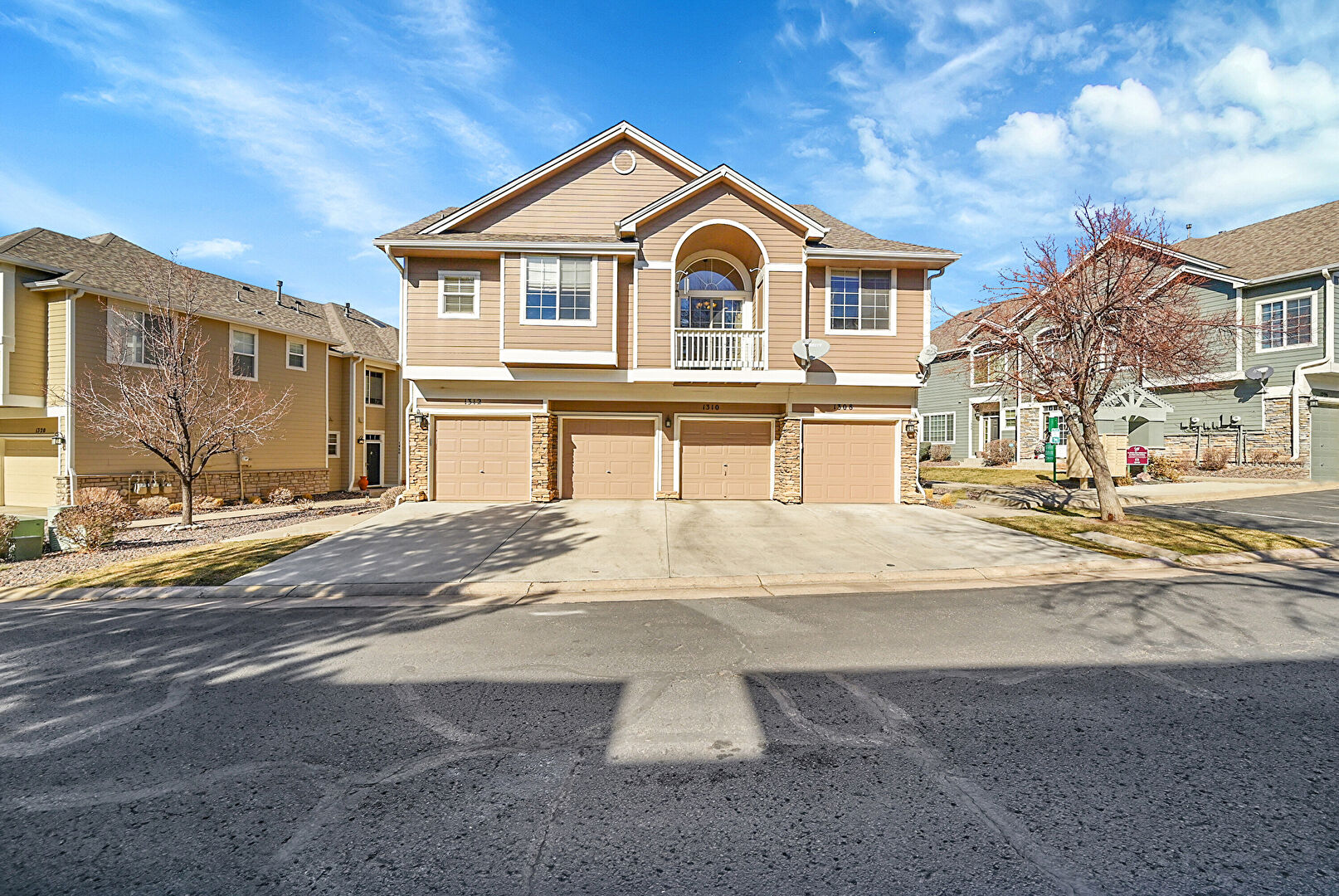 Front at 1308 Carlyle Park Cir, Highlands, CO 80129, listed by Marla Cody