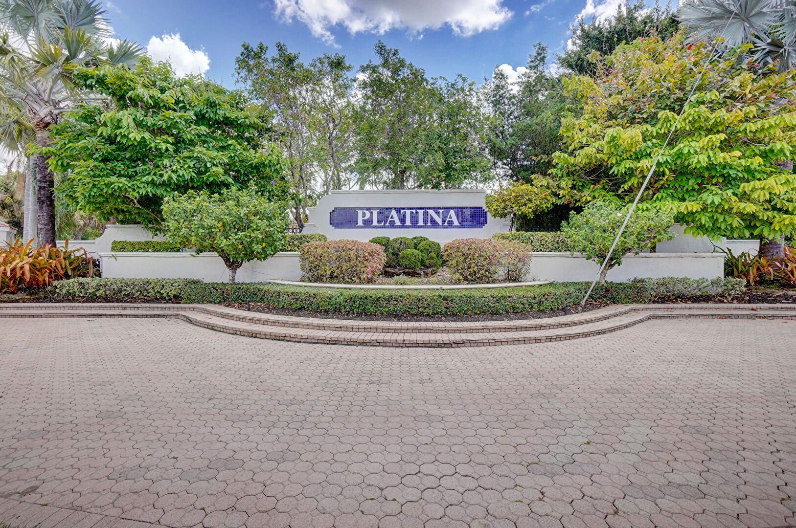 Community Sign at 5187 Europa Drive, Unit A, Boynton Beach, FL 33437, listed by Renata Janus