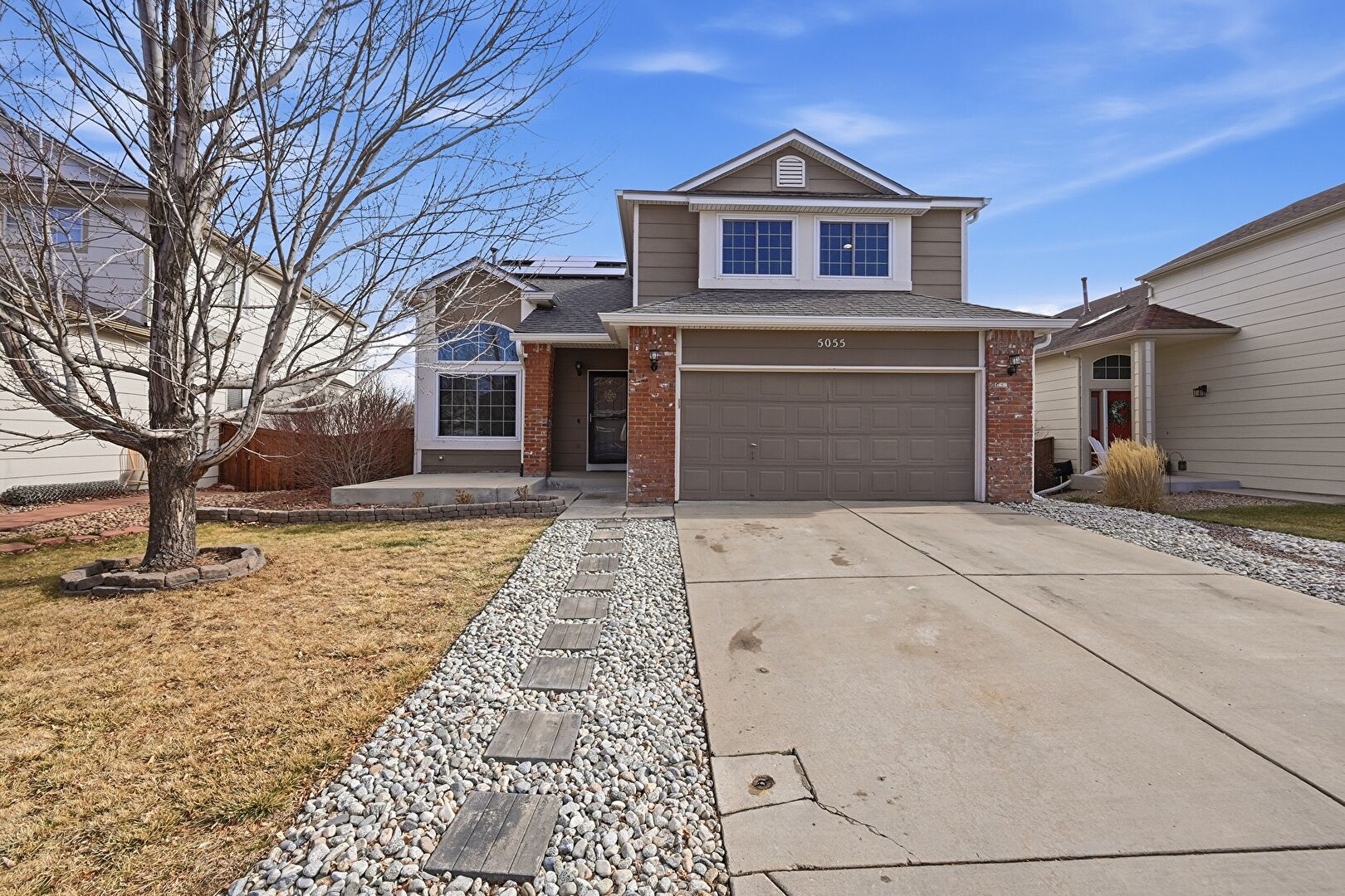 Front at 5055 Weeping Willow Circle, Littleton, CO 80130, listed by Cesar Pena