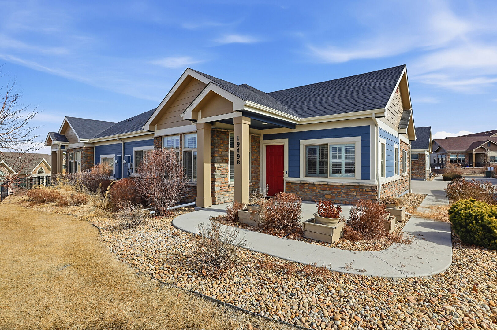 Front at 1949 South Flanders Way Unit B, Aurora, CO 80013, listed by Kelly Dolph