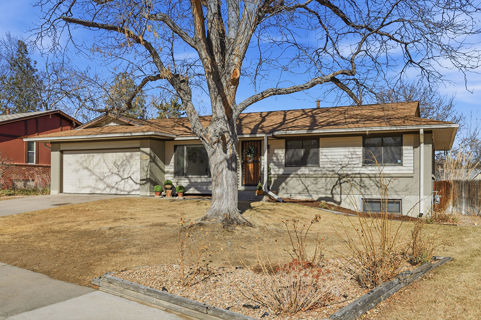 Front at 12631 West Asbury Place, Lakewood, CO 80228, listed by Julie Bonicelli-Oliva