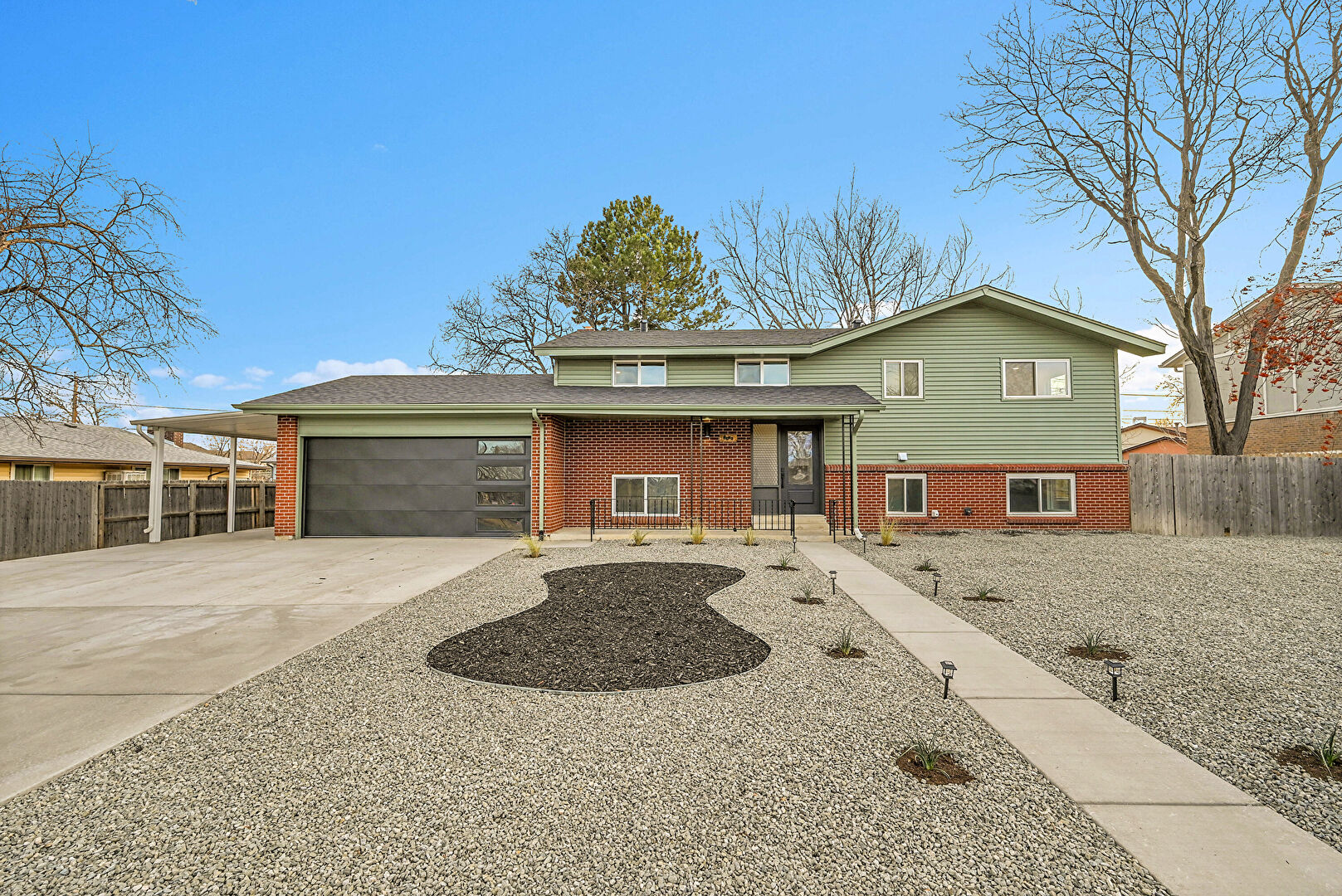 Front at 9230 West Dakota Place, Lakewood, CO 80226, listed by Lauren Wilson