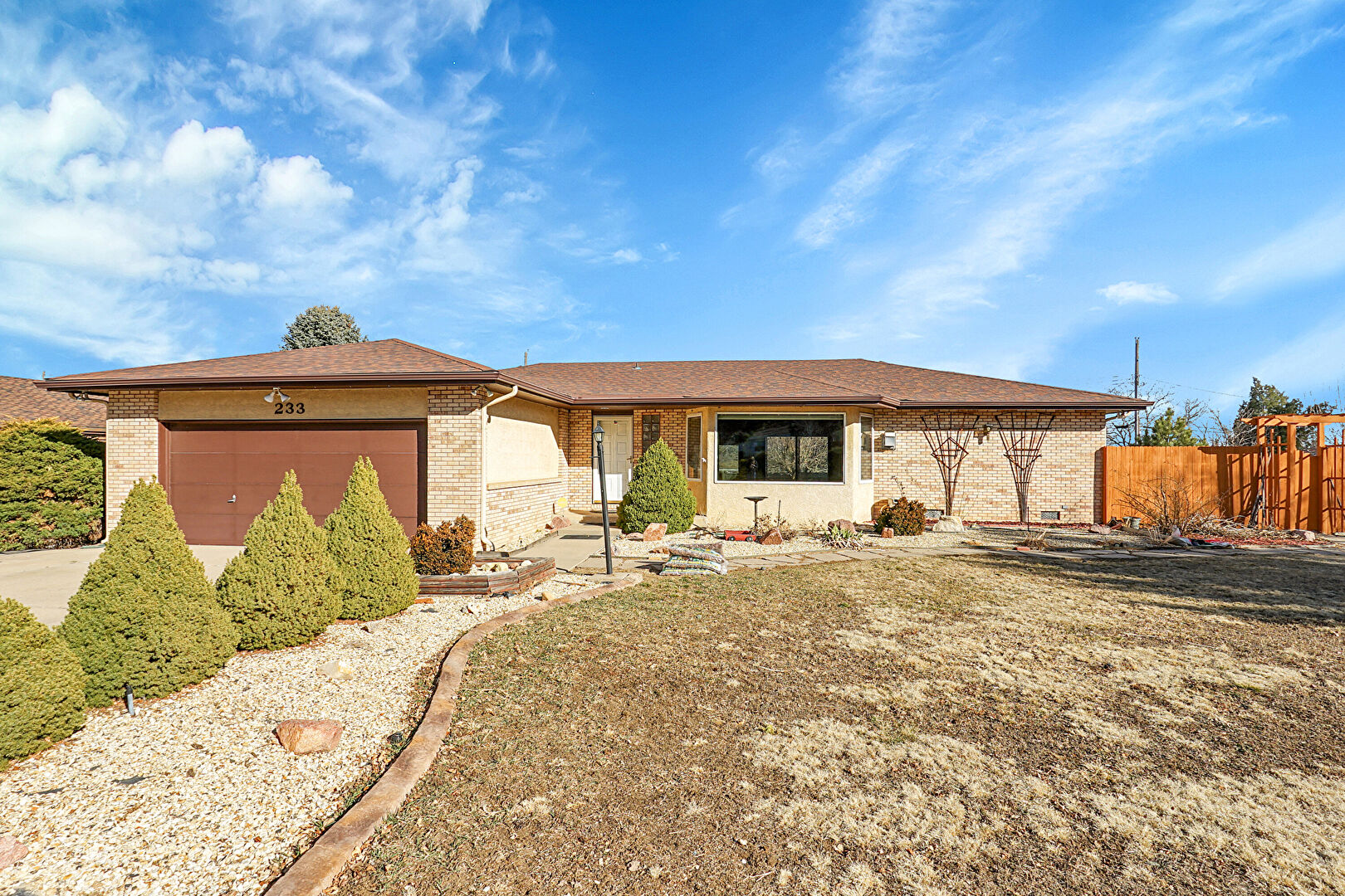 Front at 233 Crestridge Avenue, Colorado Springs, CO 80906, listed by Taylor Haas