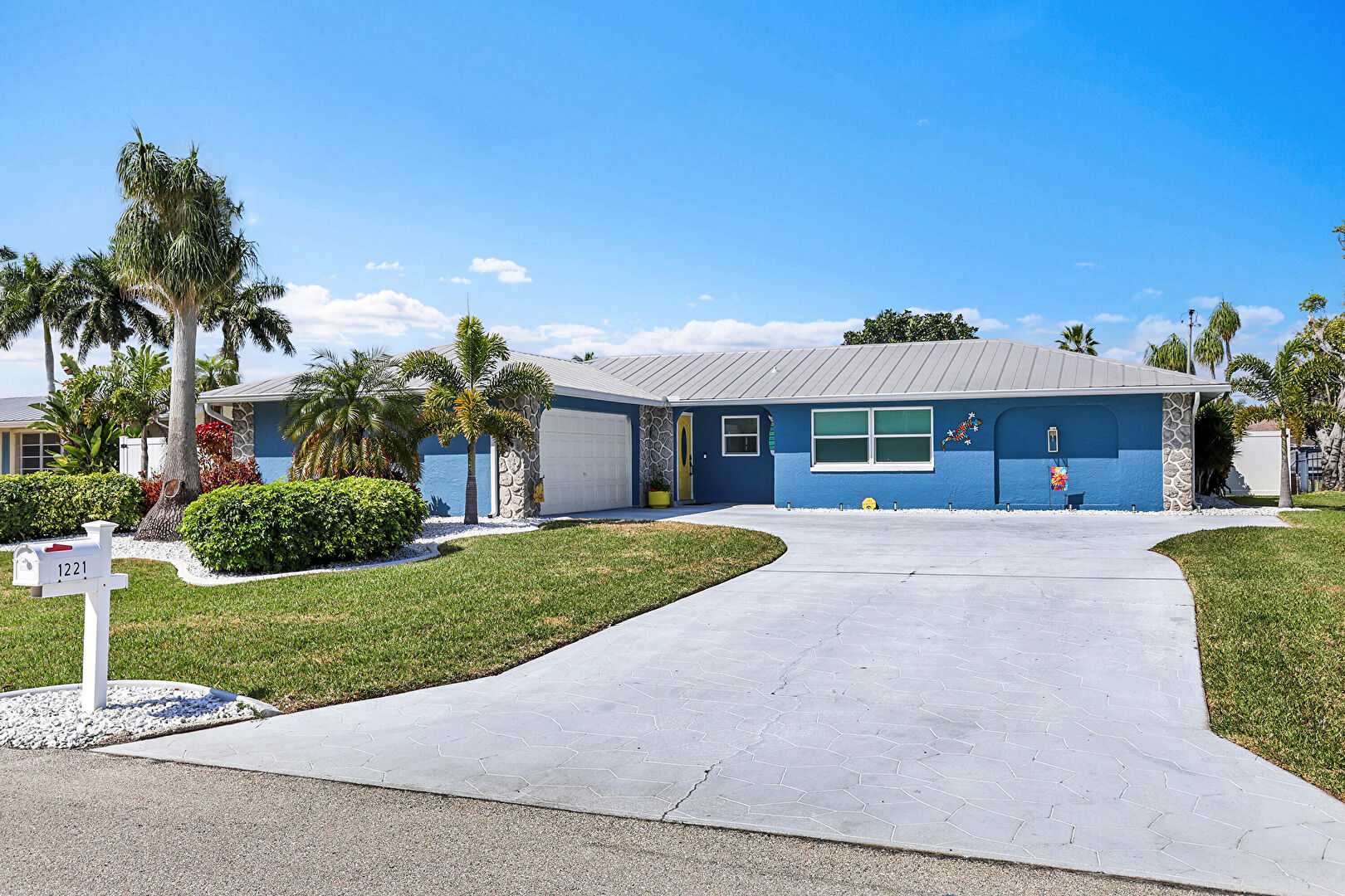Front at 1221 Southeast 43rd Terrace, Cape Coral, FL 33904, listed by Marceleen Wurst