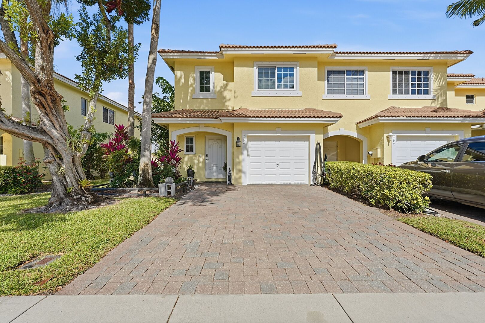 Front at 1174 Imperial Lake Road, West Palm Beach, FL 33413, listed by Mary Lee Cheever-Ortiz