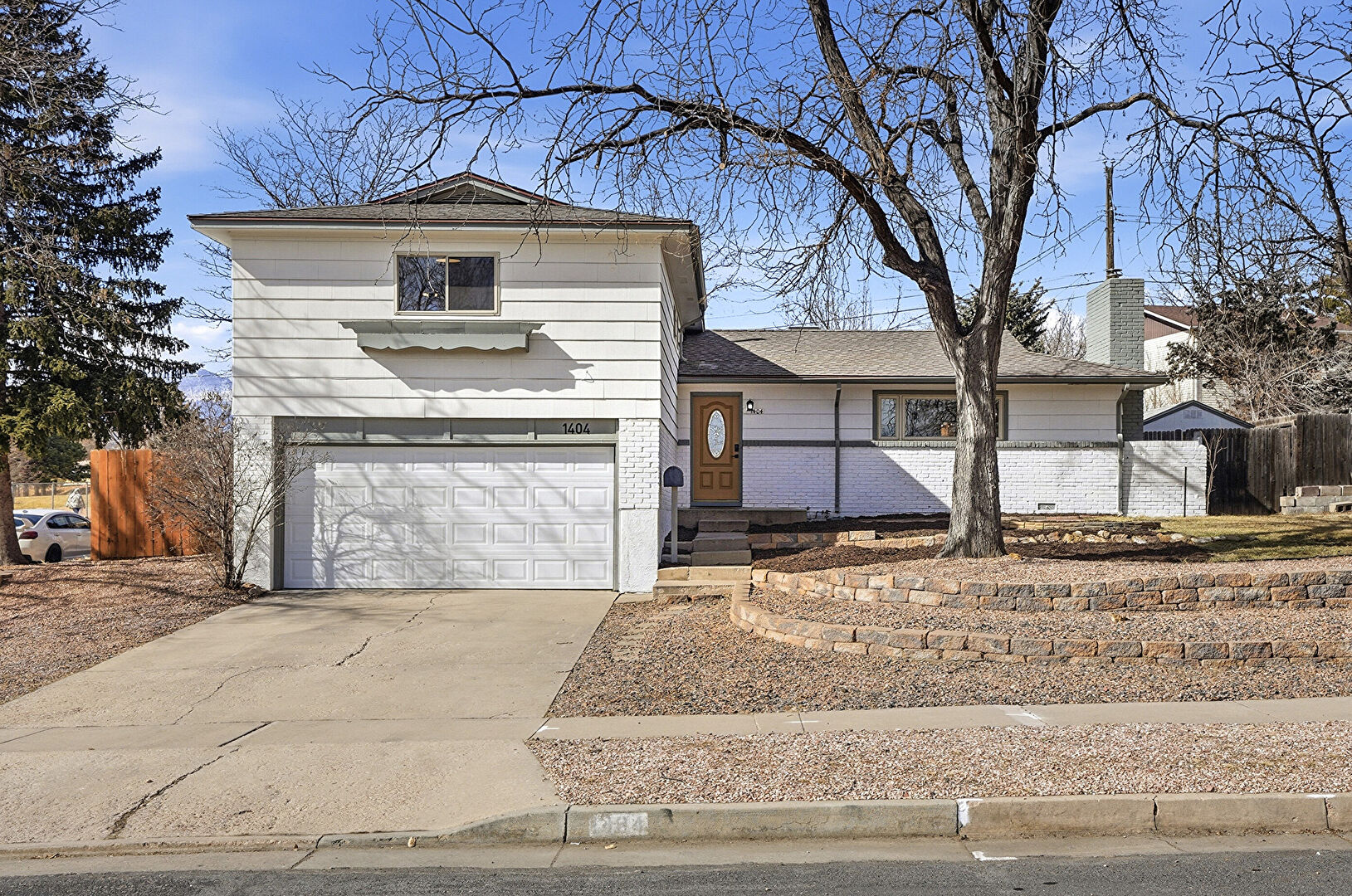 Front yard at 1404 North Chelton Road, Colorado Springs, CO 80909, listed by Terry Moss