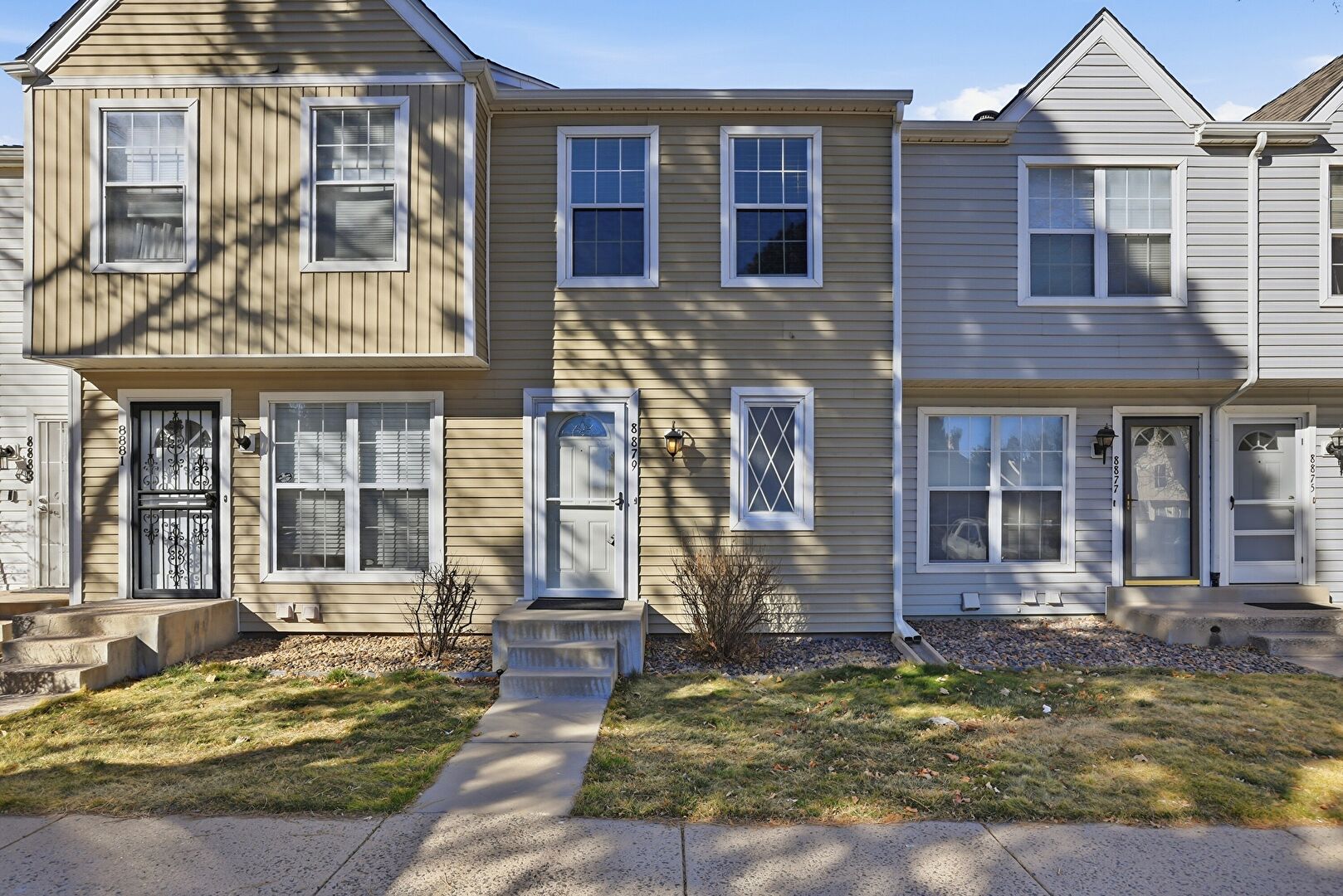 Front at 8879 West Floyd Avenue, Lakewood, CO 80227, listed by Diana Nelson