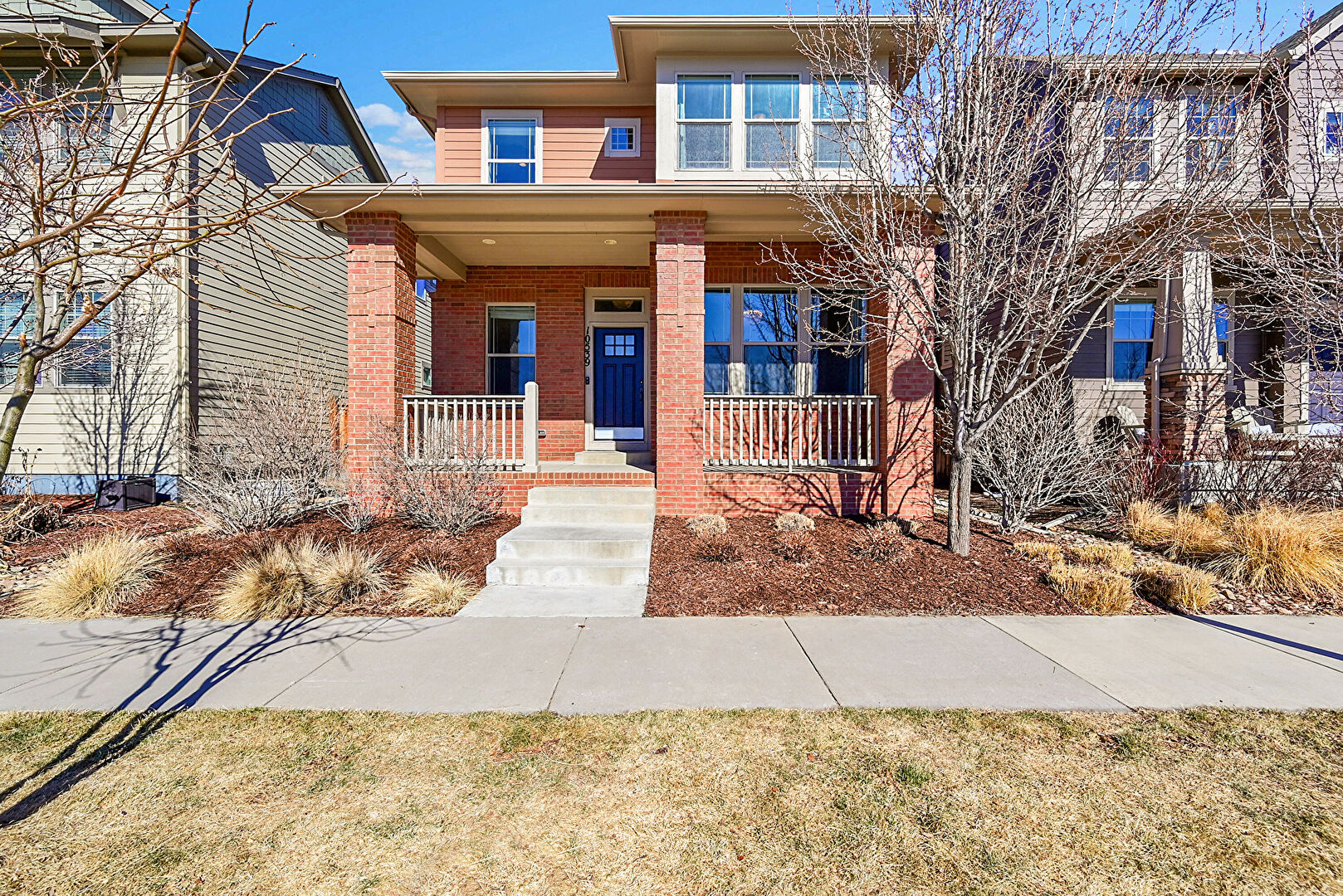 Front at 10539 East 25th Drive, Aurora, CO 80010, listed by Wei Lin