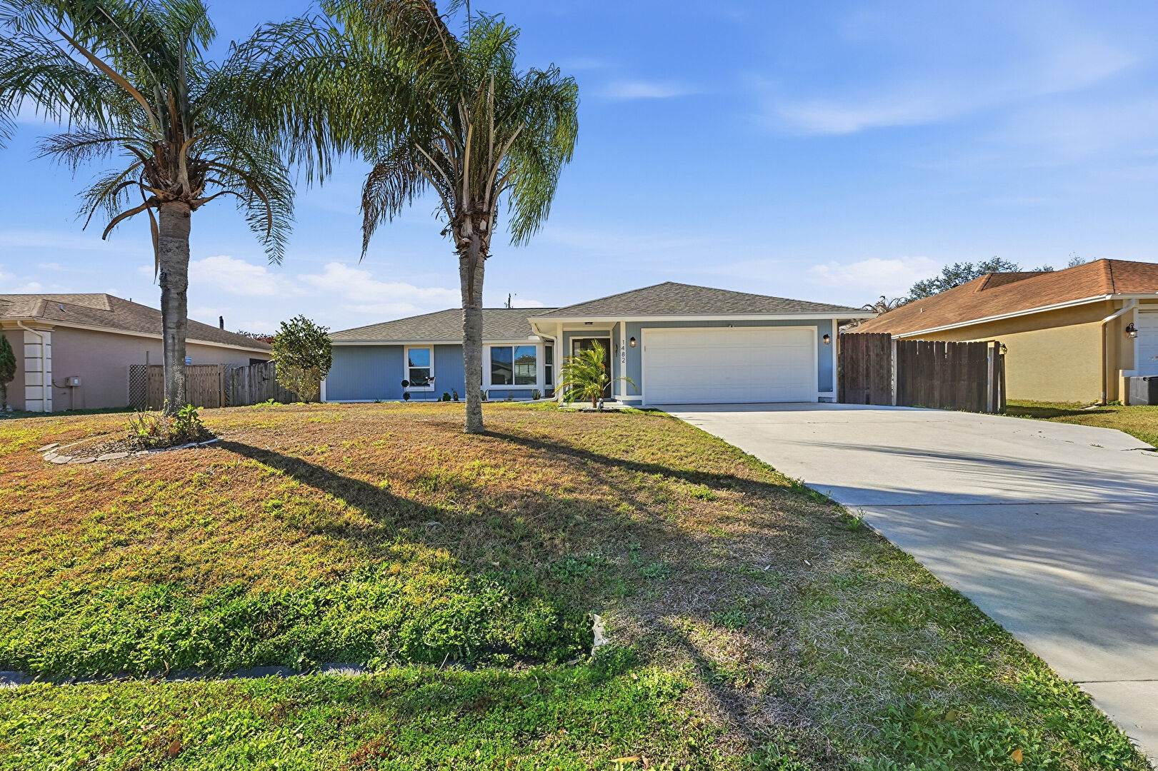 Front at 1482 Southwest Dow Lane, Port St. Lucie, FL 34953, listed by Amanda Flesch