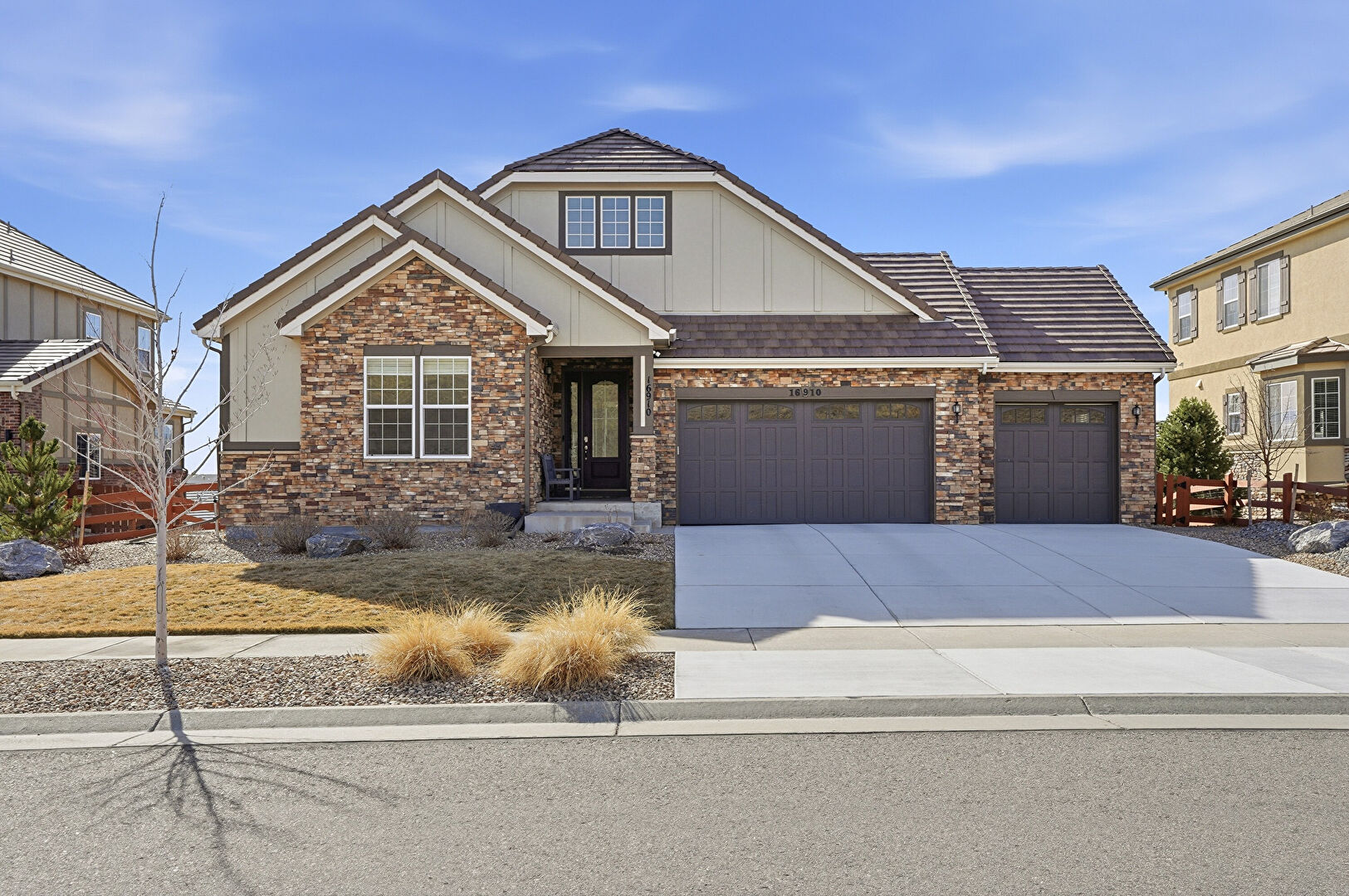 Front at 16910 West 95th Place, Arvada, CO 80007, listed by Christy Hepp