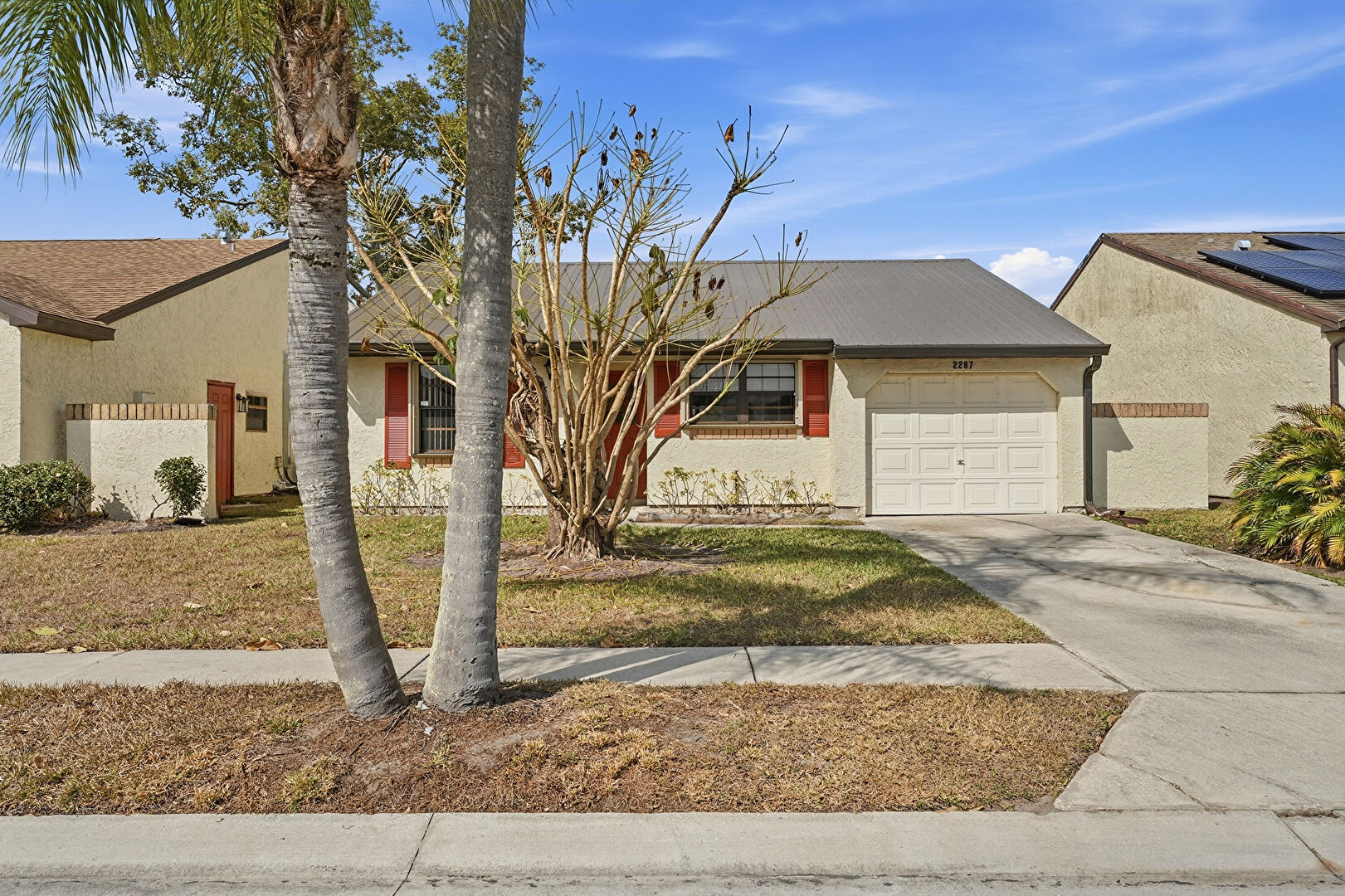 Front at 2287 Southeast Barrington Street, Port St. Lucie, FL 34952, listed by Jason M Coley