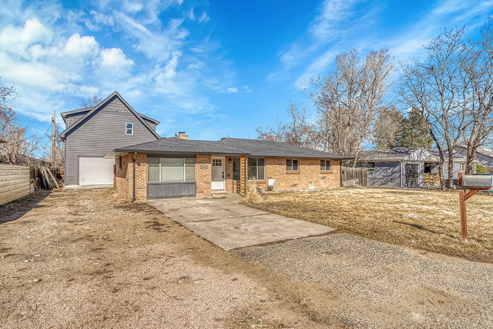 Front at 10685 West 47th Avenue, Wheat Ridge, CO 80033, listed by Amanda Lam