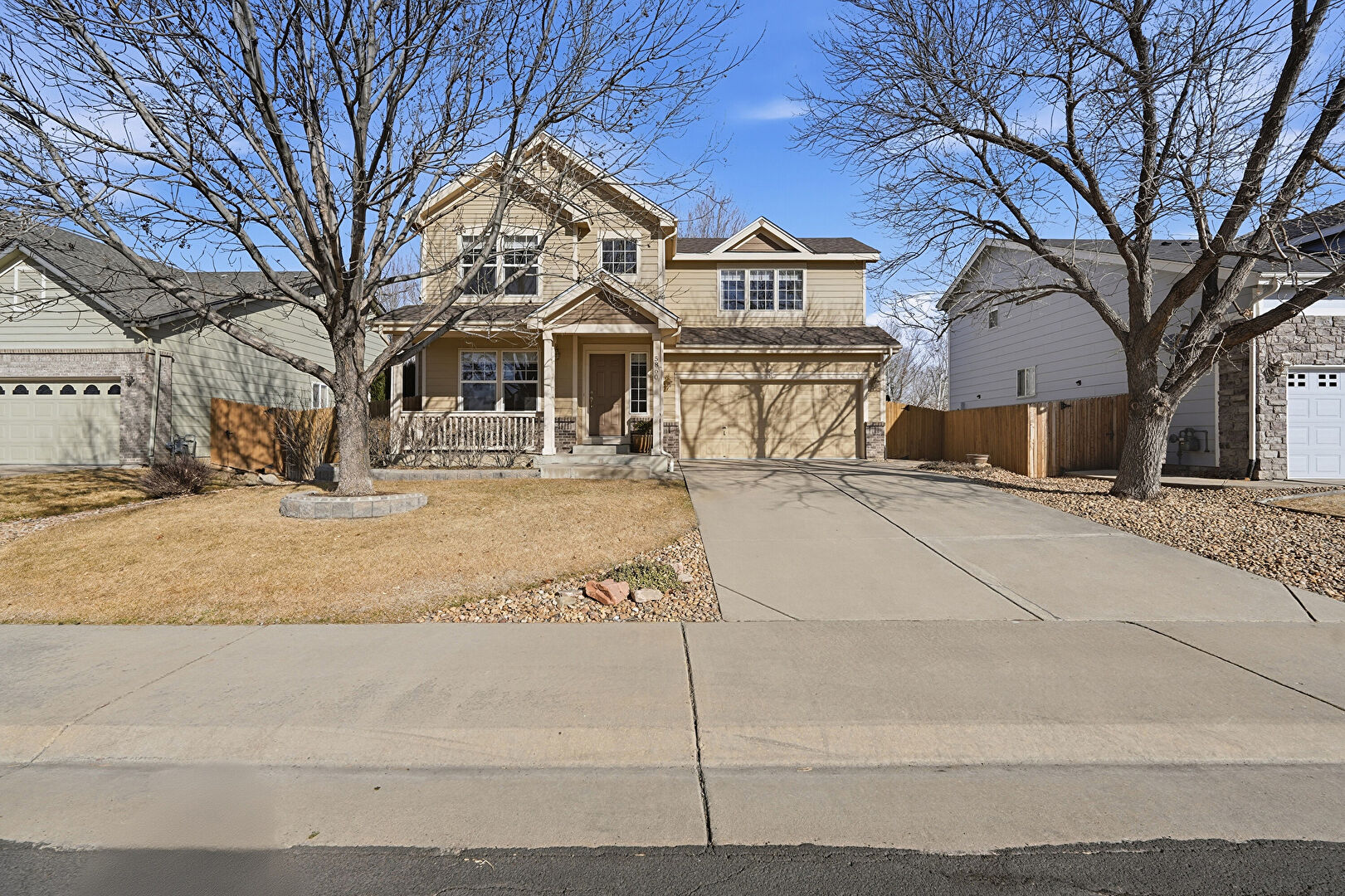 Front at 5860 Canyon Circle, Longmont, CO 80504, listed by Eric Morris