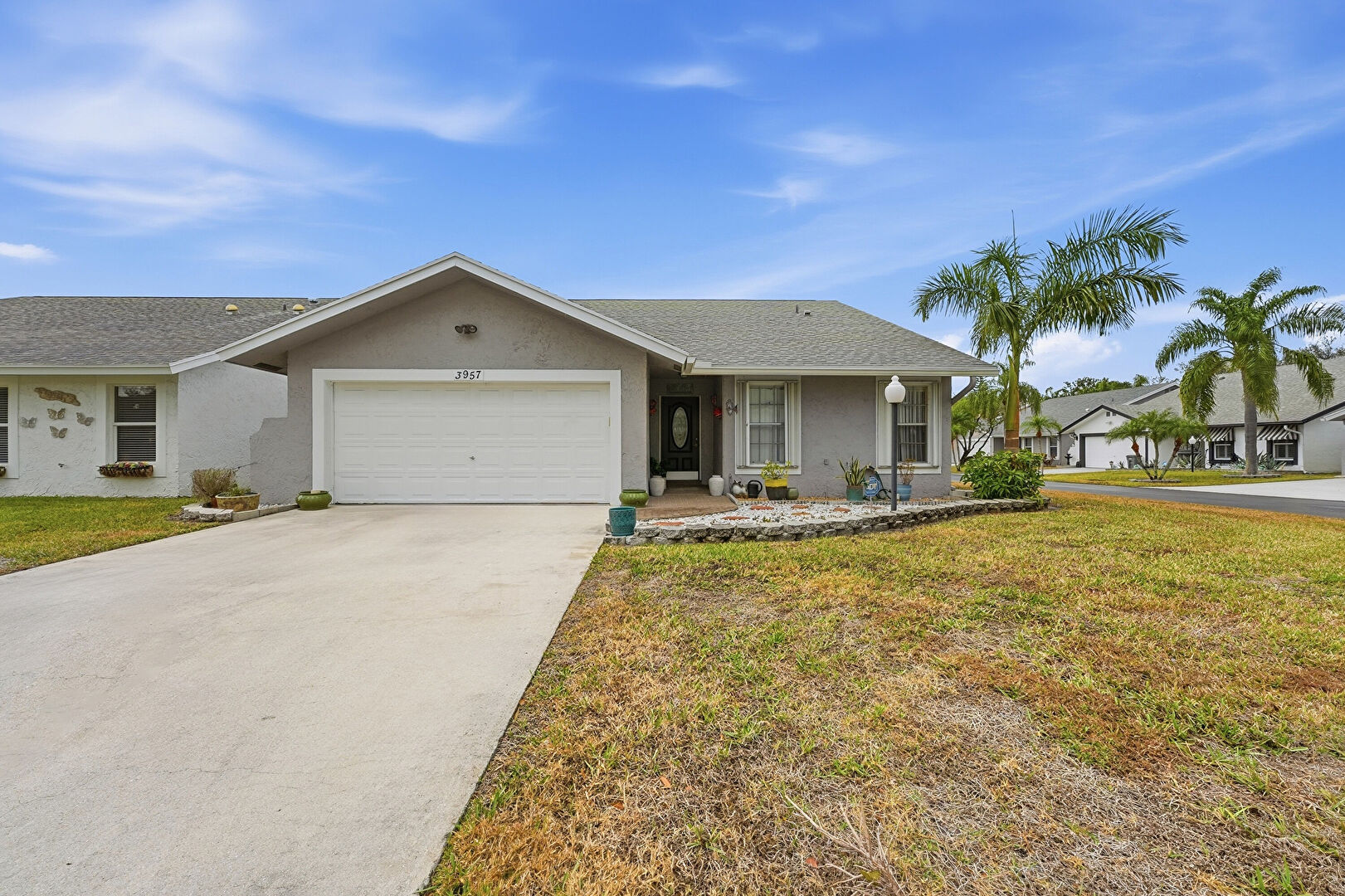 Front at 3957 Dafilee Circle, West Palm Beach, FL 33417, listed by Becky Urbina
