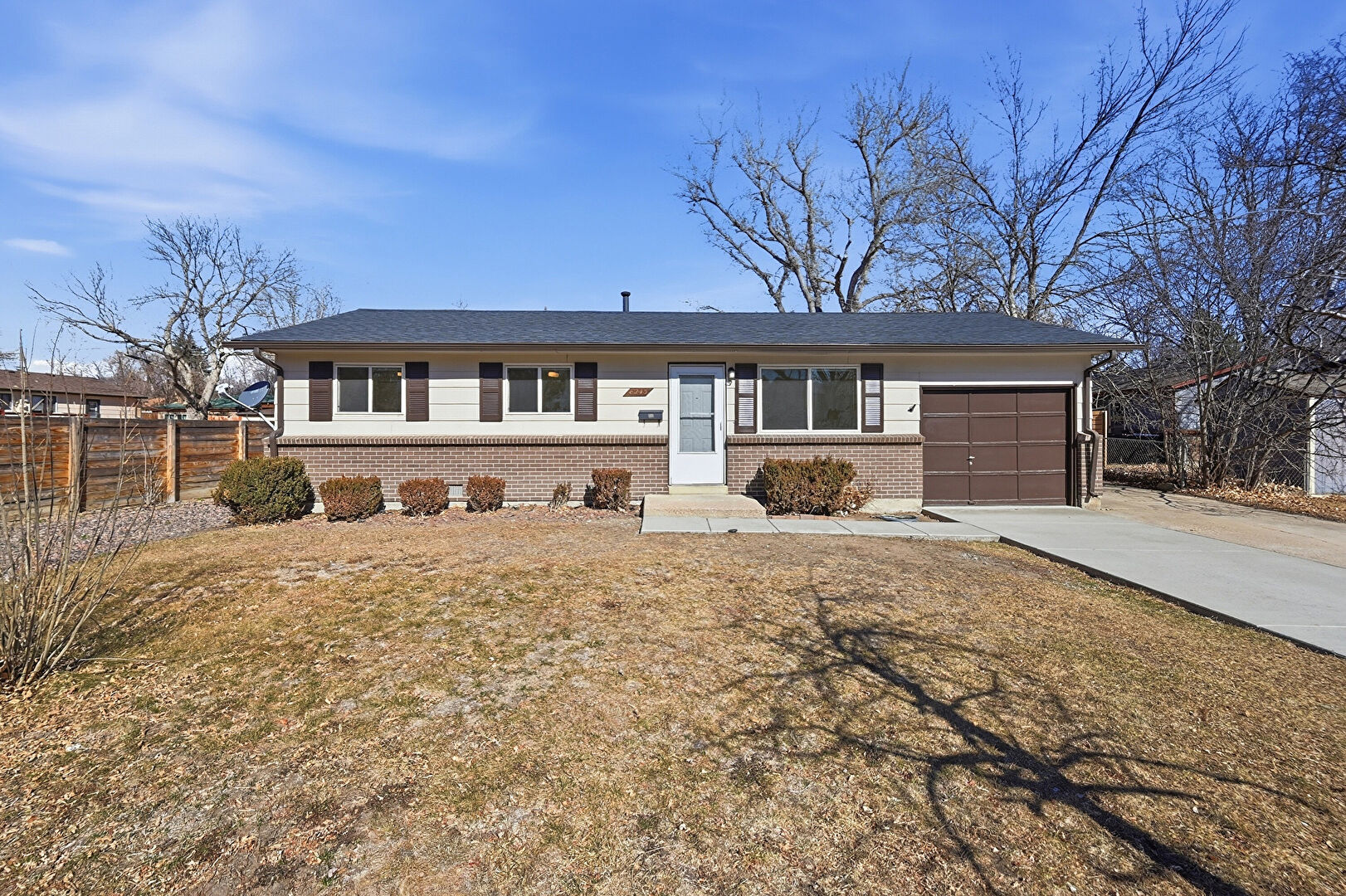Front at 8243 Brooks Drive, Arvada, CO 80004, listed by Lori Keesey, MLS ID: 1729933