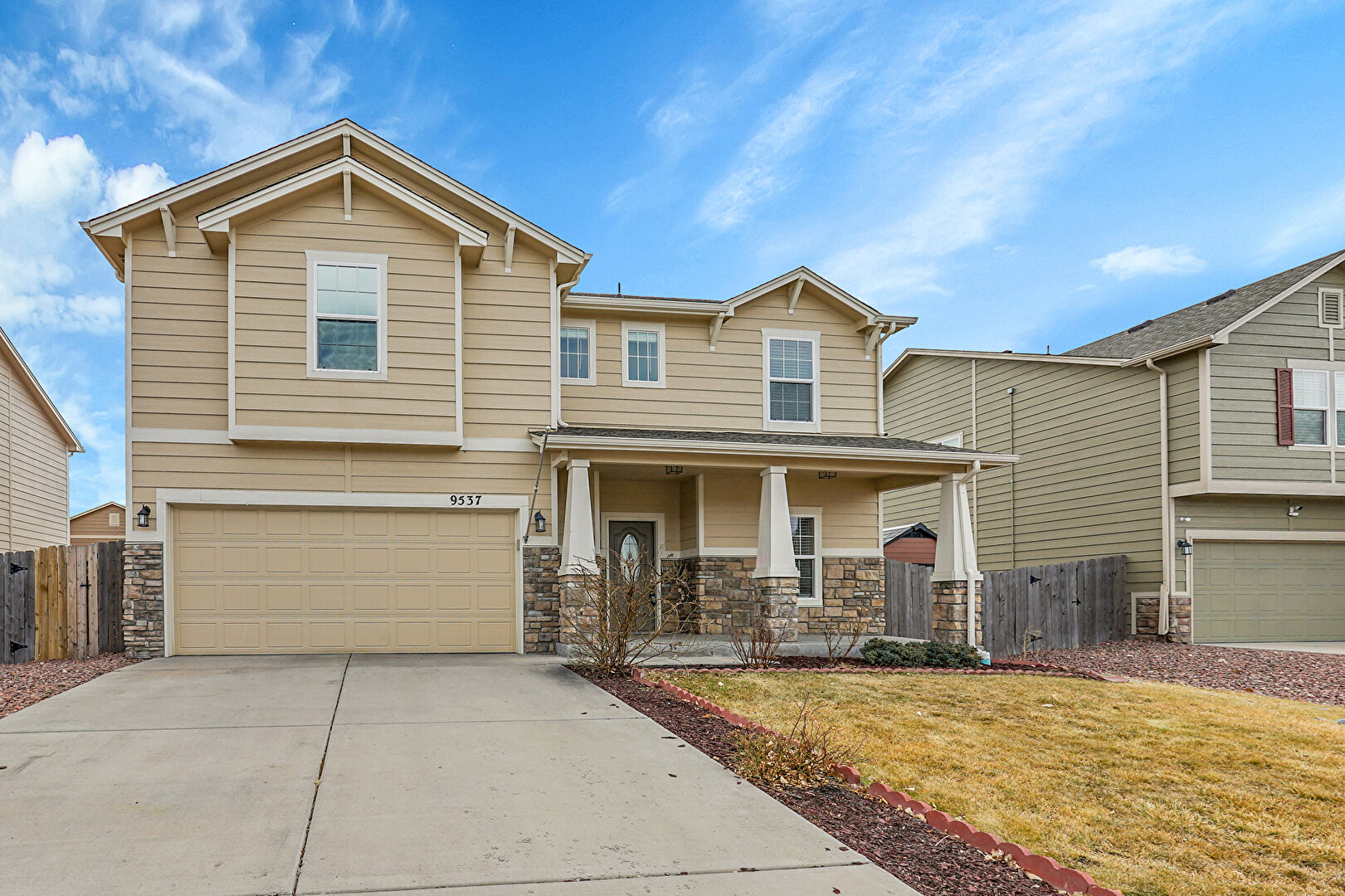 Front at 9537 Ghost Flower Lane, Colorado Springs, CO 80925, listed by Taylor Haas