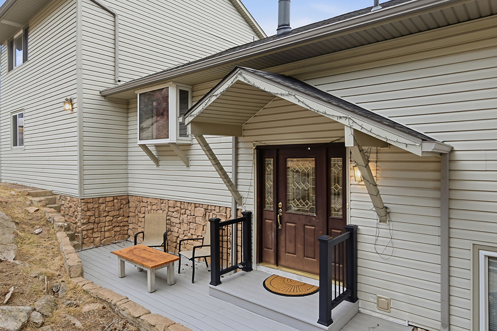 Exterior Entry at 22725 Cook Lane, Morrison, CO 80465, listed by Rachel Mulvihill