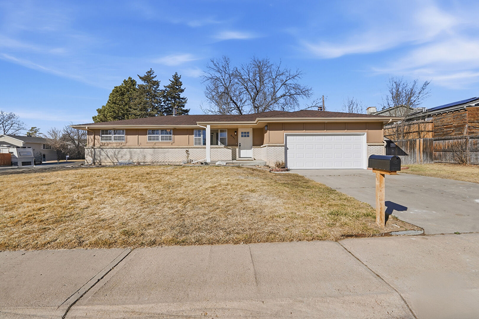 Front at 6131 Wolff Street, Arvada, CO 80003, listed by Magali Fredrick