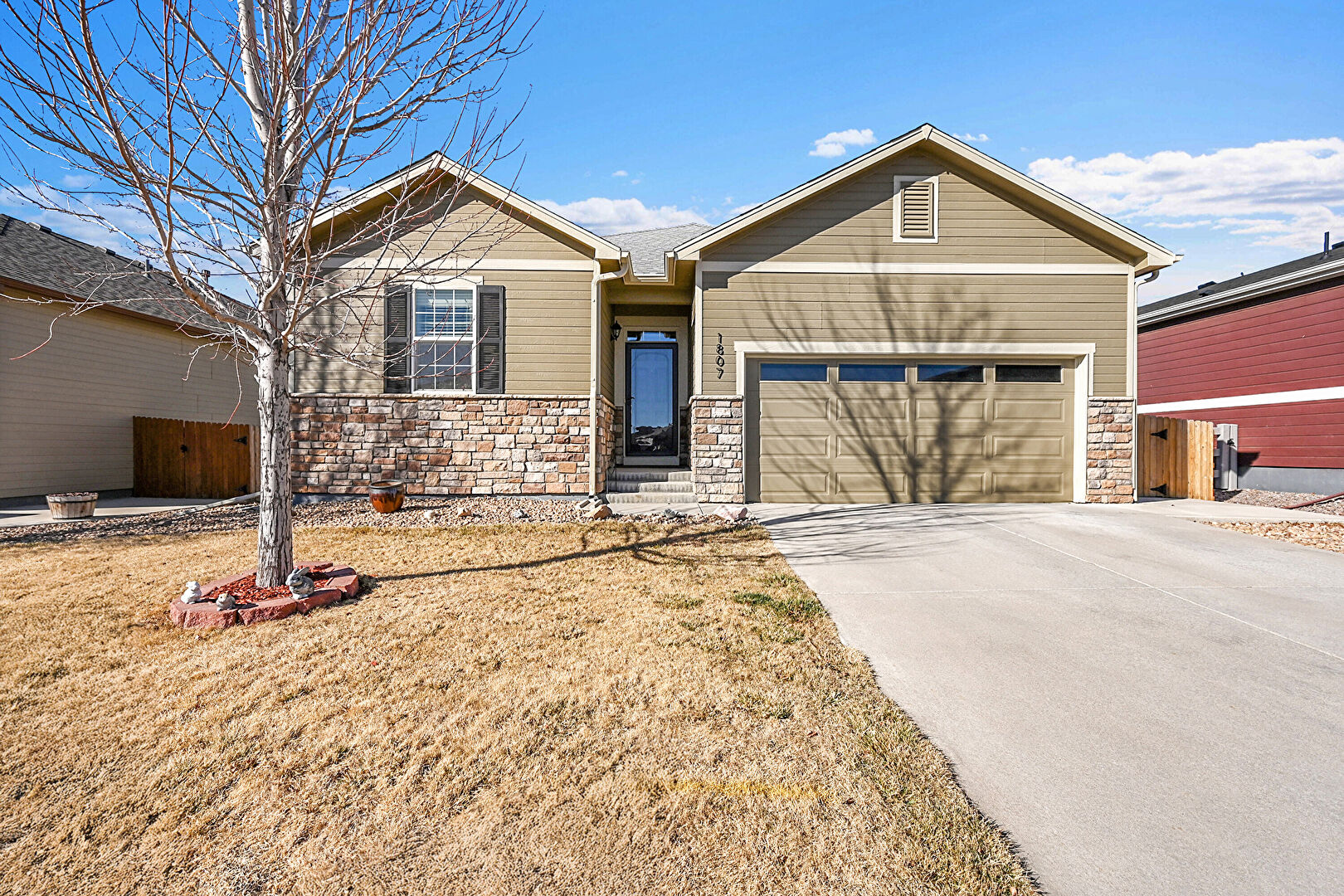 Front at 1807 Homestead Drive, Fort Lupton, CO 80621, listed by Kimberly Poplawski