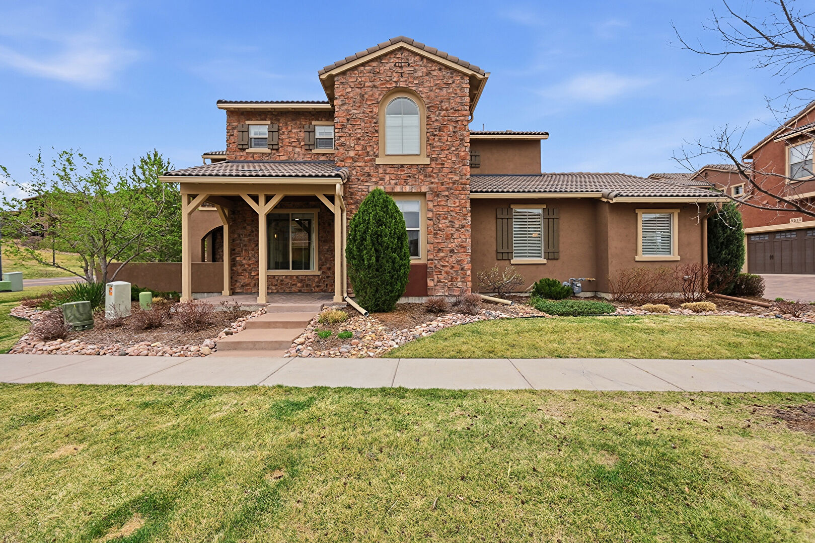 Front at 9500 Pendio Court, Littleton, CO 80126, listed by Russ Porter