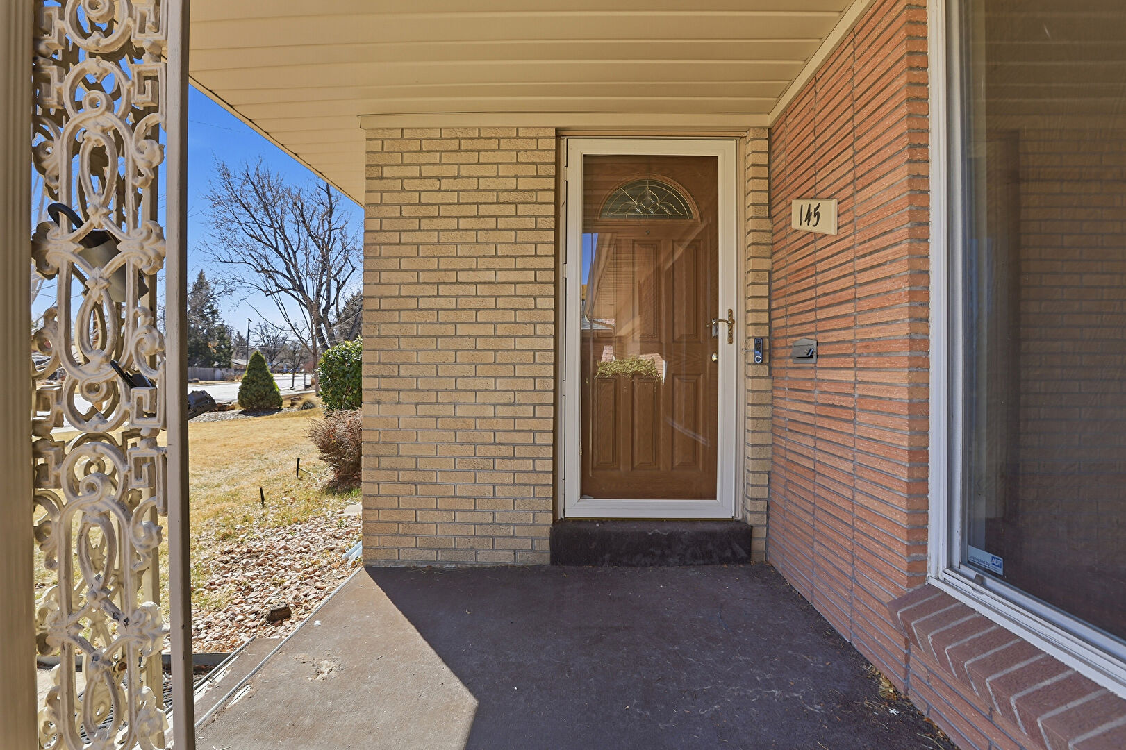 Exterior Entry at 145 Dudley Street, Lakewood, CO 80226, listed by Gina Arms, MLS ID: 8031455