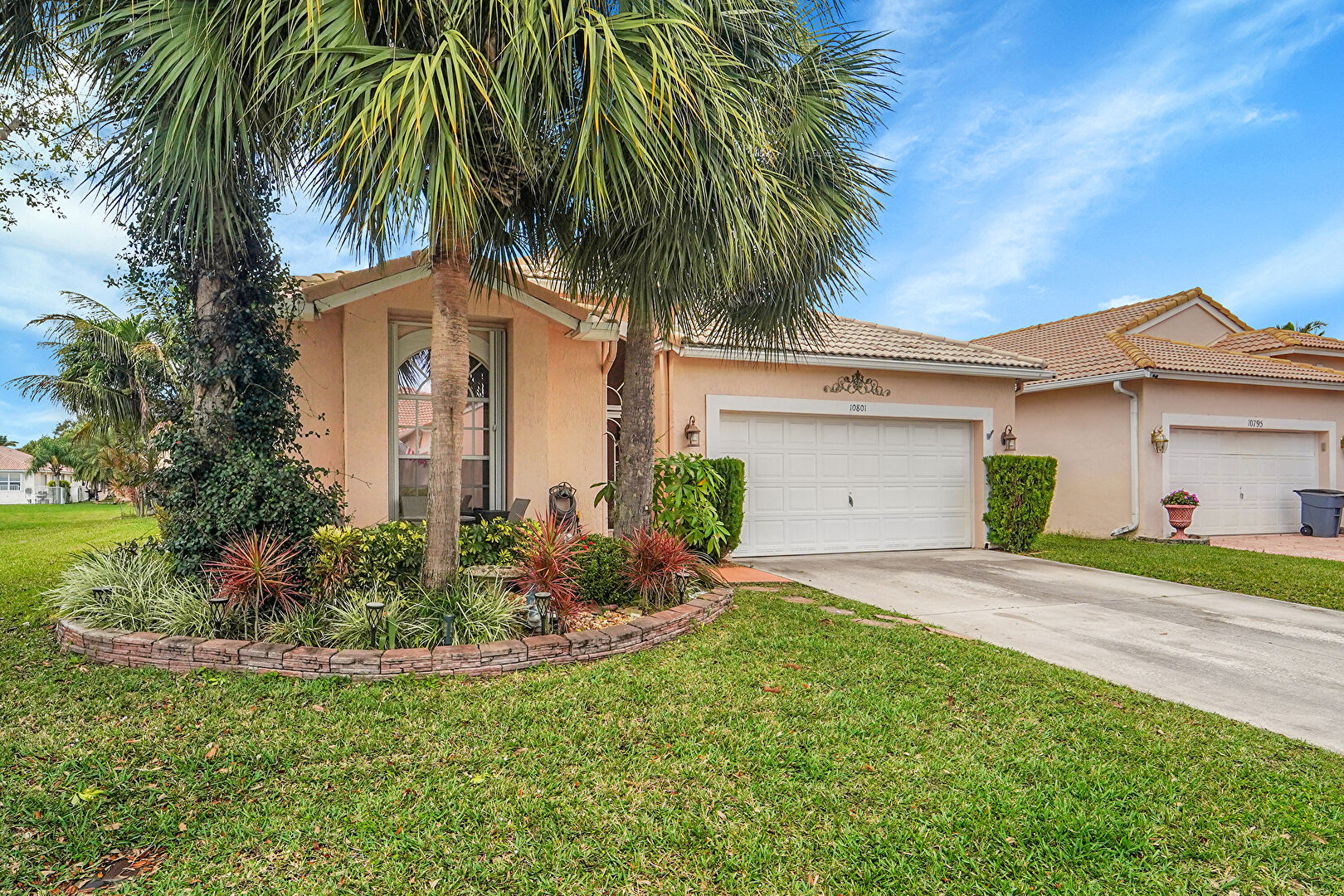 Front at 10801 Grant Way, Boynton Beach, FL 33437, listed by Mary Banatte