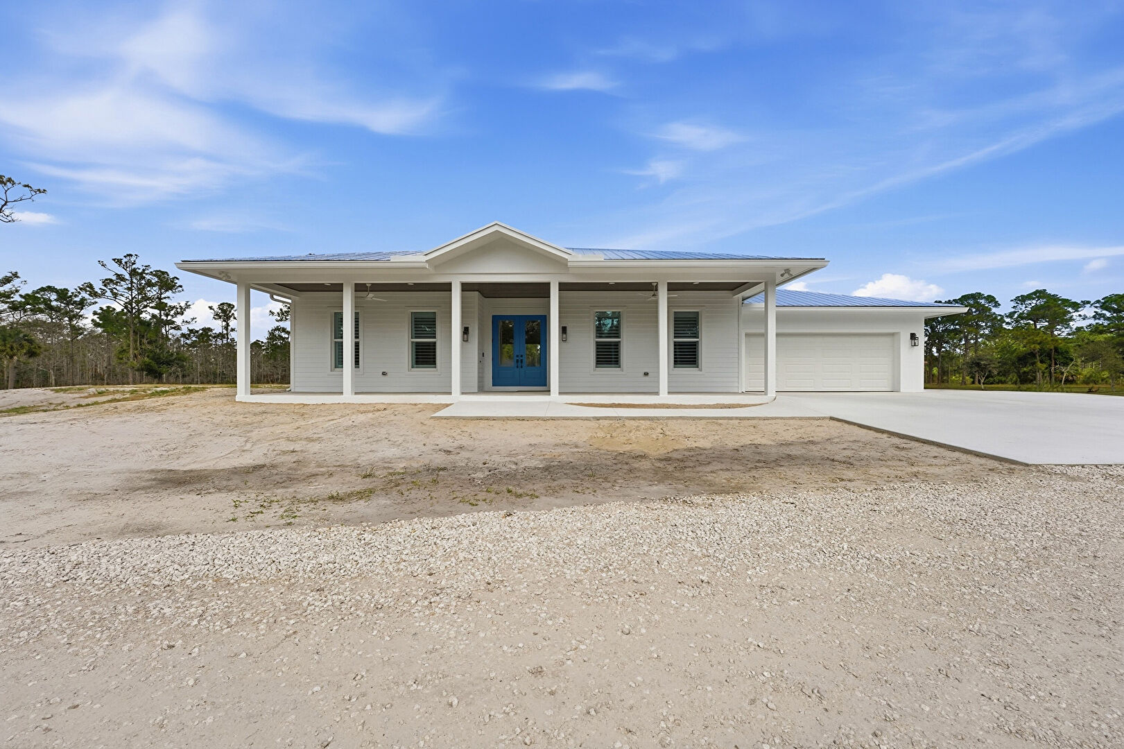 Front at 8859 Valley Oak Place, Jupiter, FL 33478, listed by Darren Goldstein Ron Bill