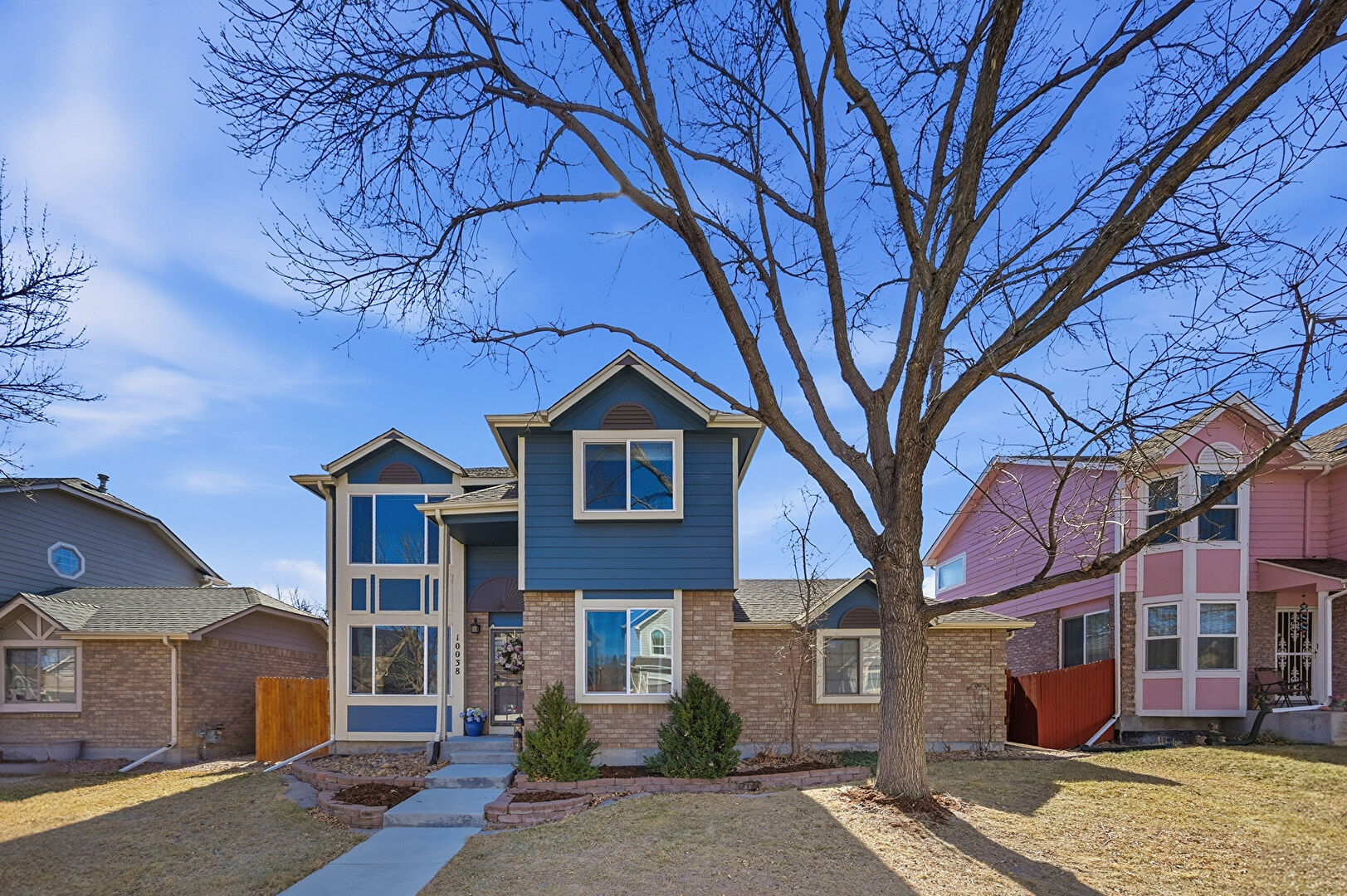Front at 10038 West 82nd Lane, Arvada, CO 80005, listed by David Mayeranderson
