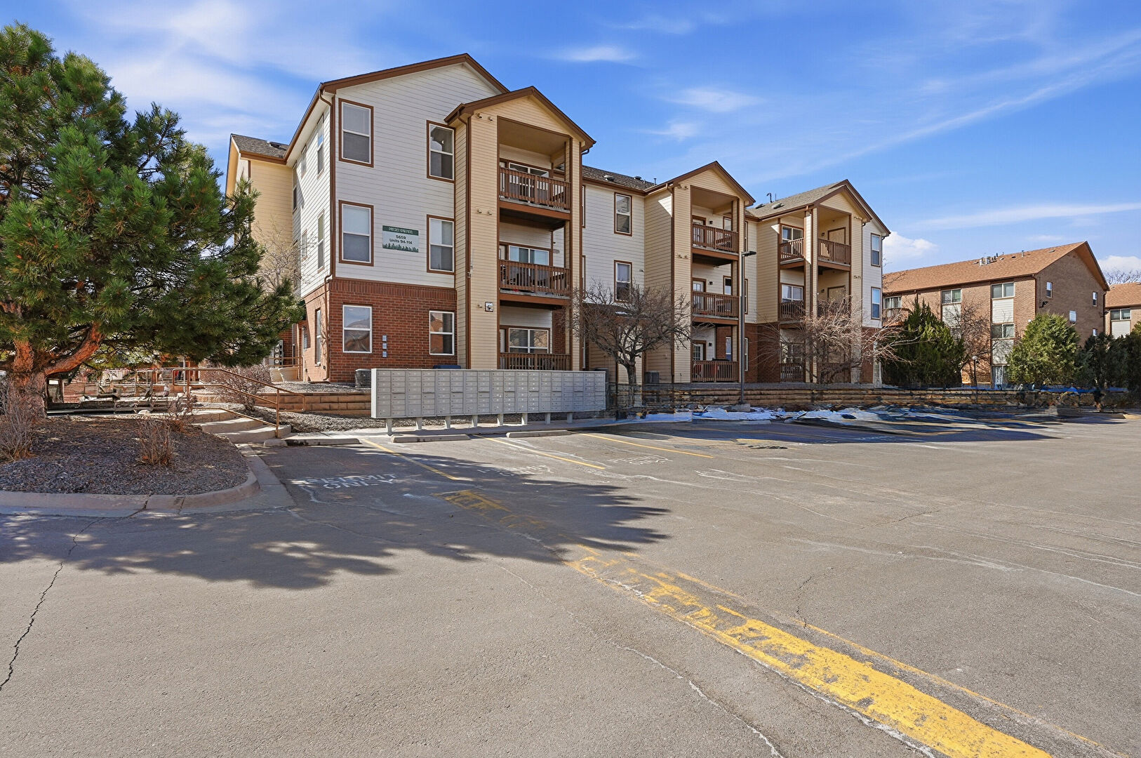 Front of Structure at 5659 Olive Street, Unit 105, Commerce City, CO 80022, listed by Brenna Frane