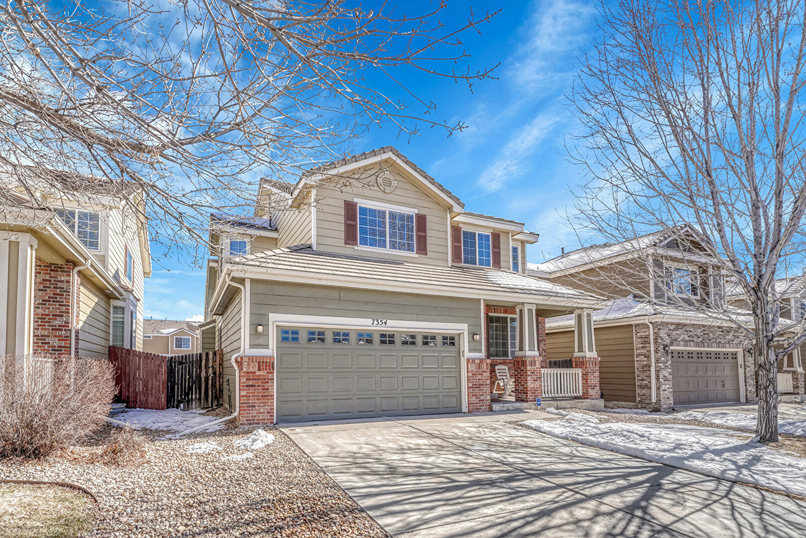 Front at 7354 South Memphis Street, Aurora, CO 80016, listed by Robert Brainard