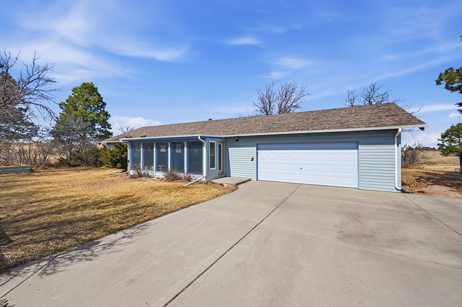 Front at 1051 Pawnee Parkway, Elizabeth, CO 80107, listed by John Dovenbarger