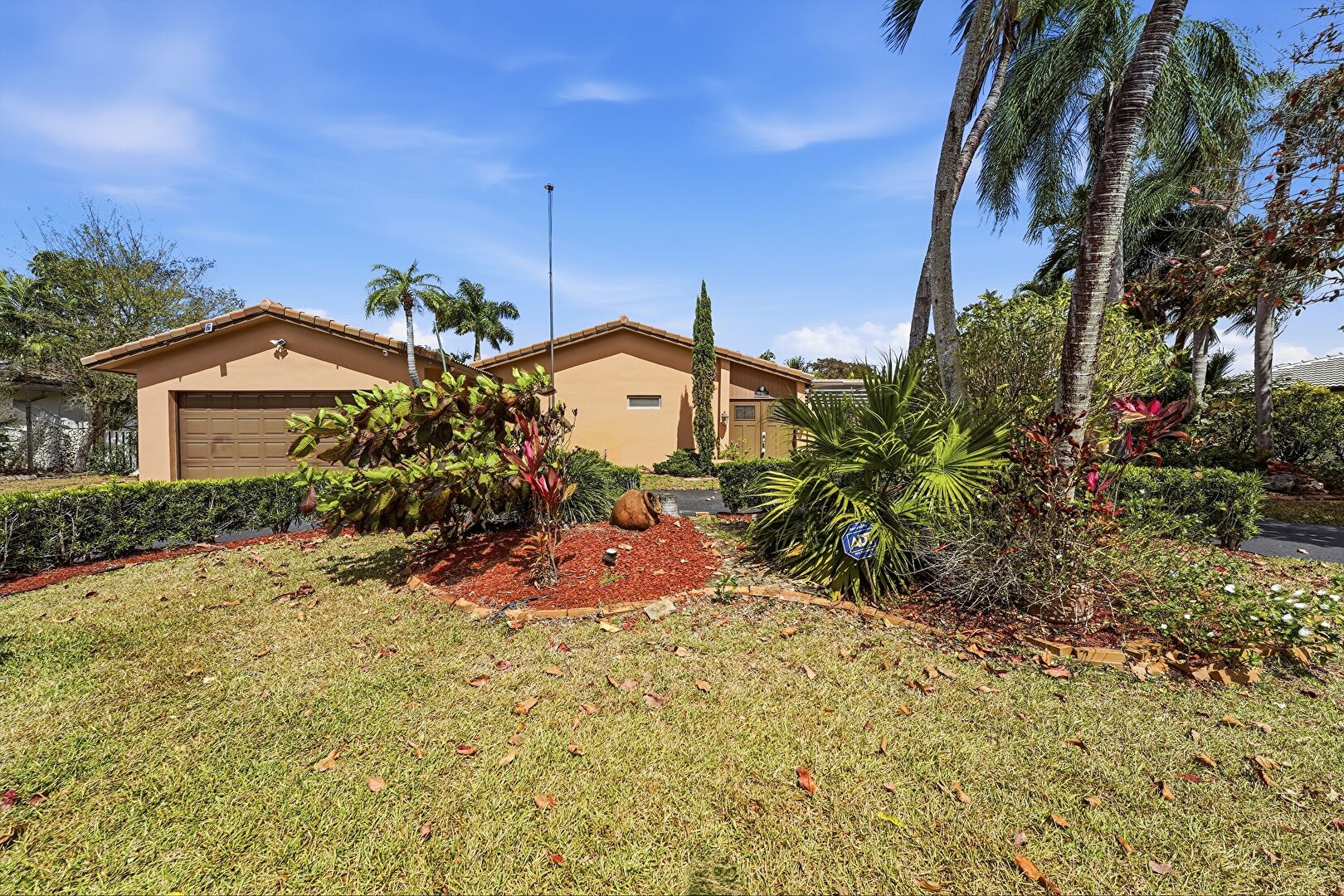 Front of Structure at 11451 Northwest 30th Street, Coral Springs, FL 33065, listed by Laura Sanders, MLS ID: f123456