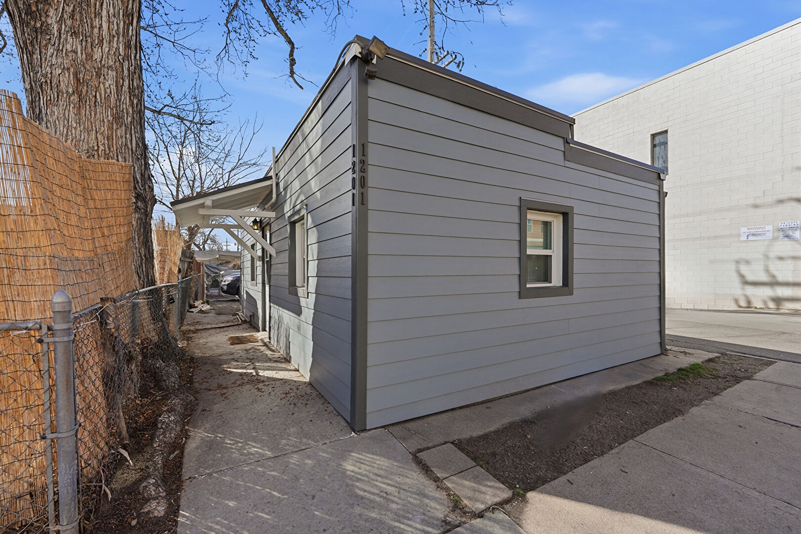 Front at 1201 South Lincoln Street, Denver, CO 80210, listed by Brenna Frane