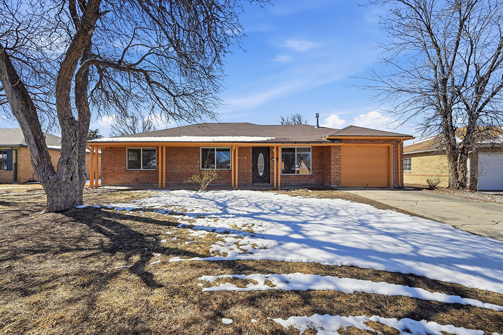 Front at 1245 Quari St, Aurora, CO 80011, listed by Taylor Haas