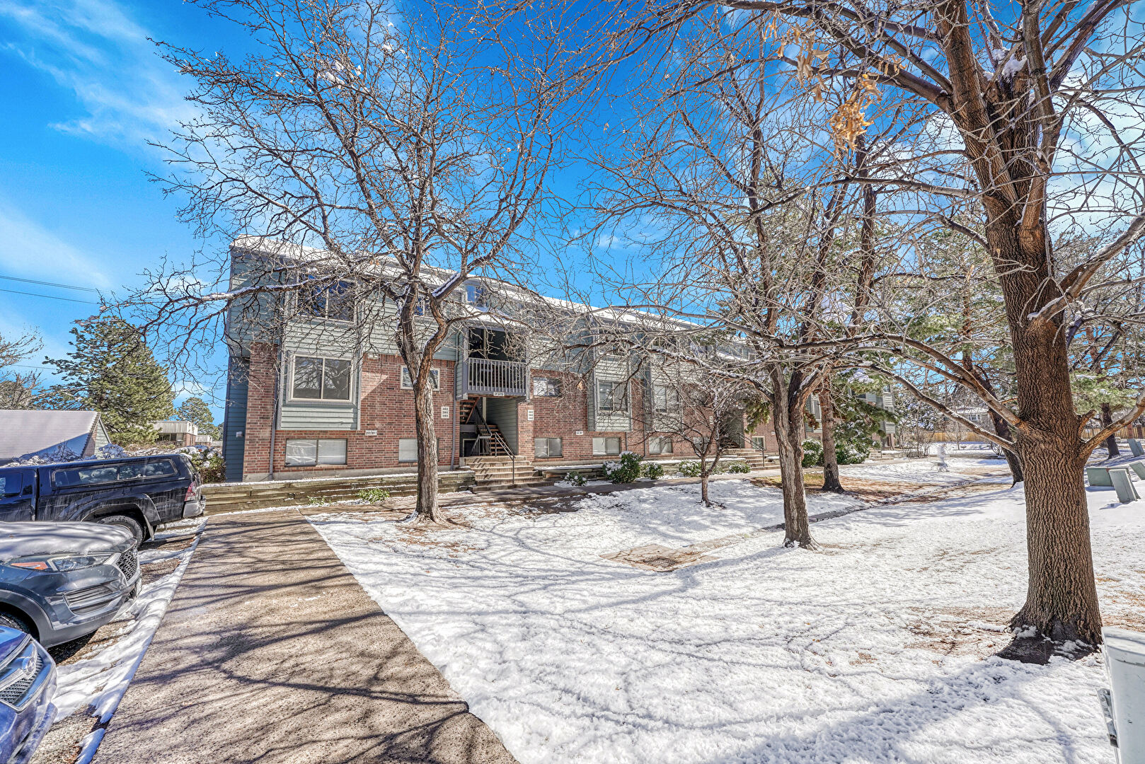 Front at 3558 South Depew Street #202, Lakewood, CO 80235, listed by Jayson Holland
