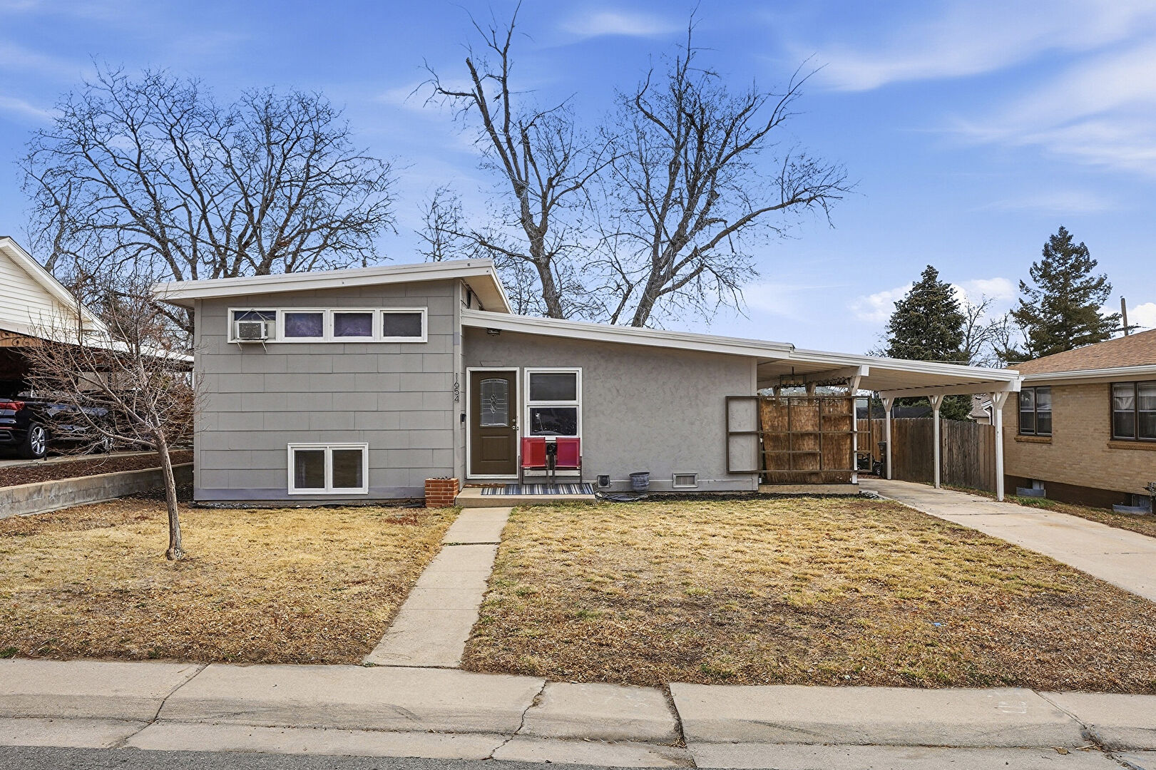 Front at 1654 South Perry Street, Denver, CO 80219, listed by Jeremiah Perry